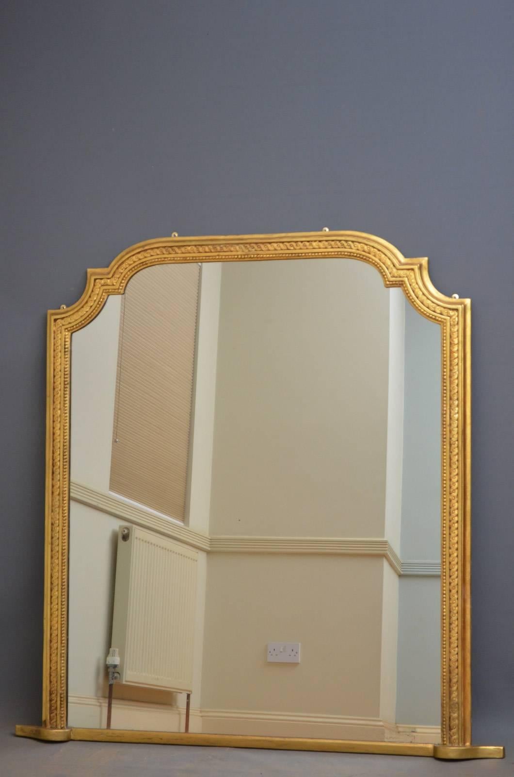 K0283, large Victorian giltwood mirror of arched form, having original mirror plate with some foxing in moulded frame. This mirror retains its original gilt with some refinishing and character with wear consistent with age and use. All in wonderful