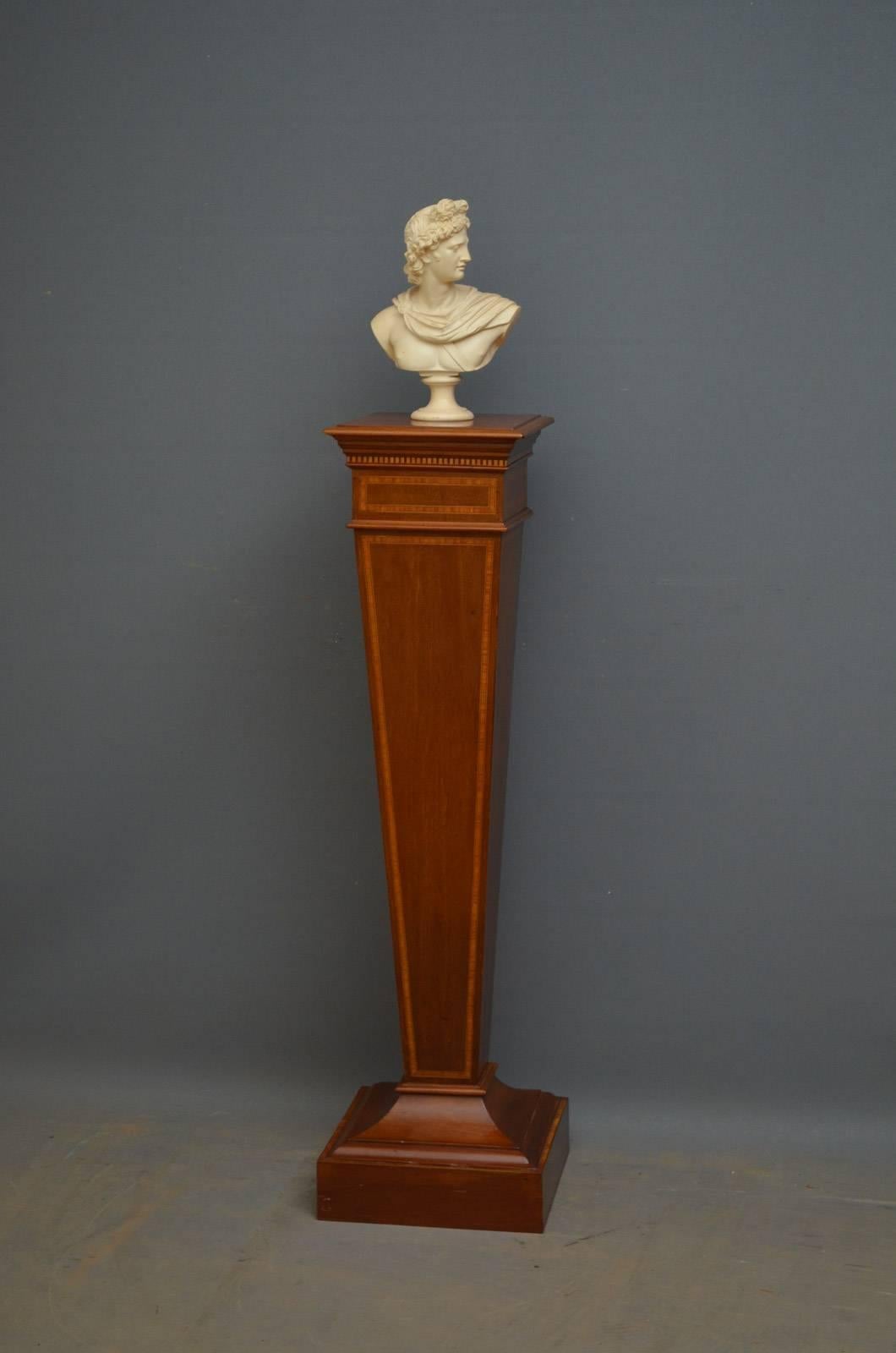 Sn4278  Elegant, Edwardian plant stand in mahogany, having squared, moulded top with boxwood inlays and satinwood crossbanding to edge, tapering column inlaid with satinwood crossbanding and ebony inlay stringing terminating in concave moulding with