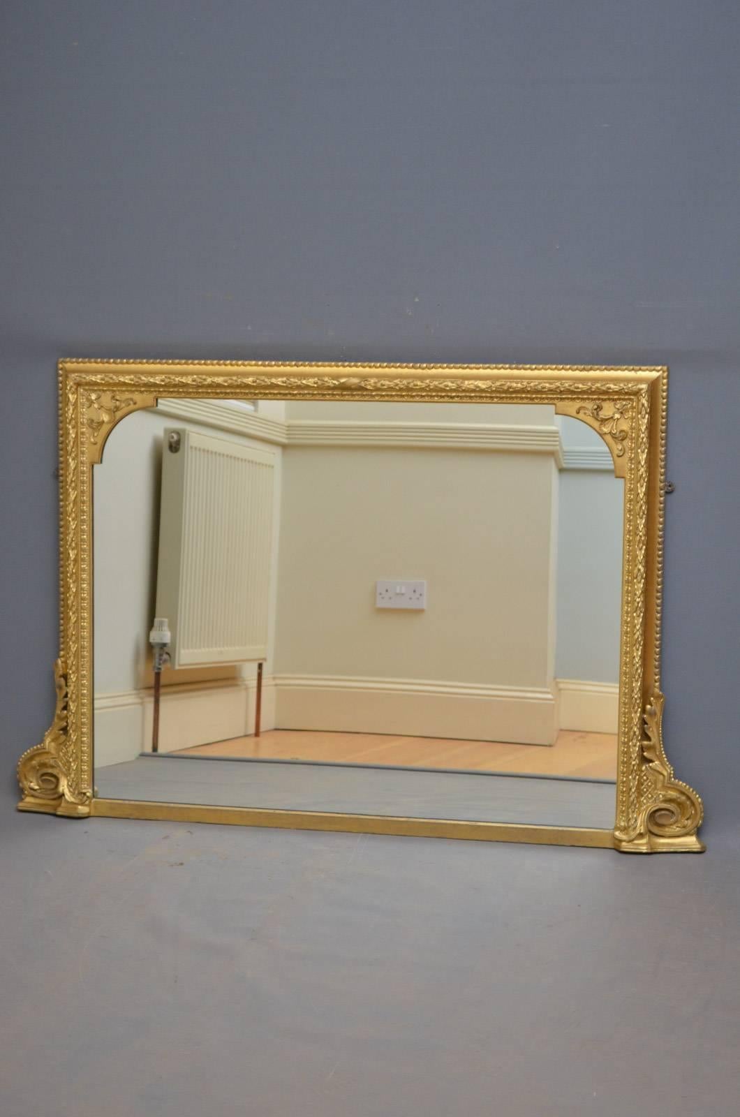 J00 fine and elegant Victorian gilded mirror of horizontal form, having original mirror plate with some imperfections in finely carved and decorated frame. All in wonderful original condition throughout. circa 1860
Measures: H 33