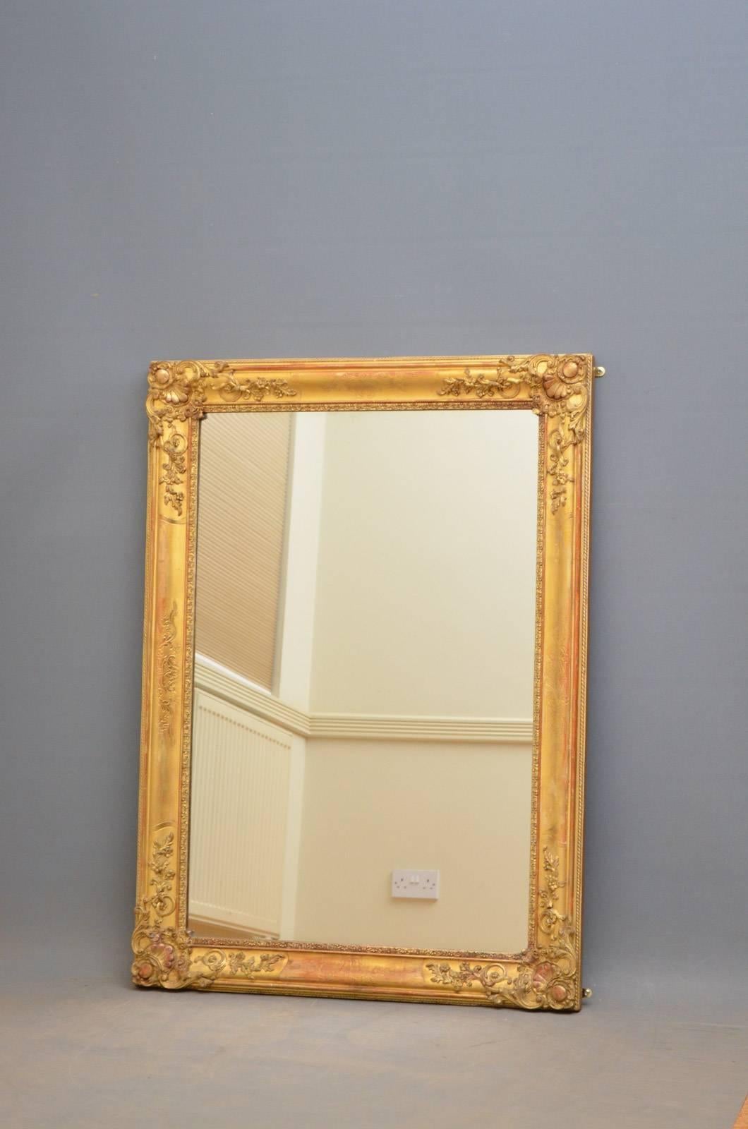 Sn4267, a 19th century French mirror of versatile form could be positioned portrait or landscape, having original mirror plate with some foxing in beautifully carved and gilded frame. This antique gilt mirror has been sympathetically restored, is in