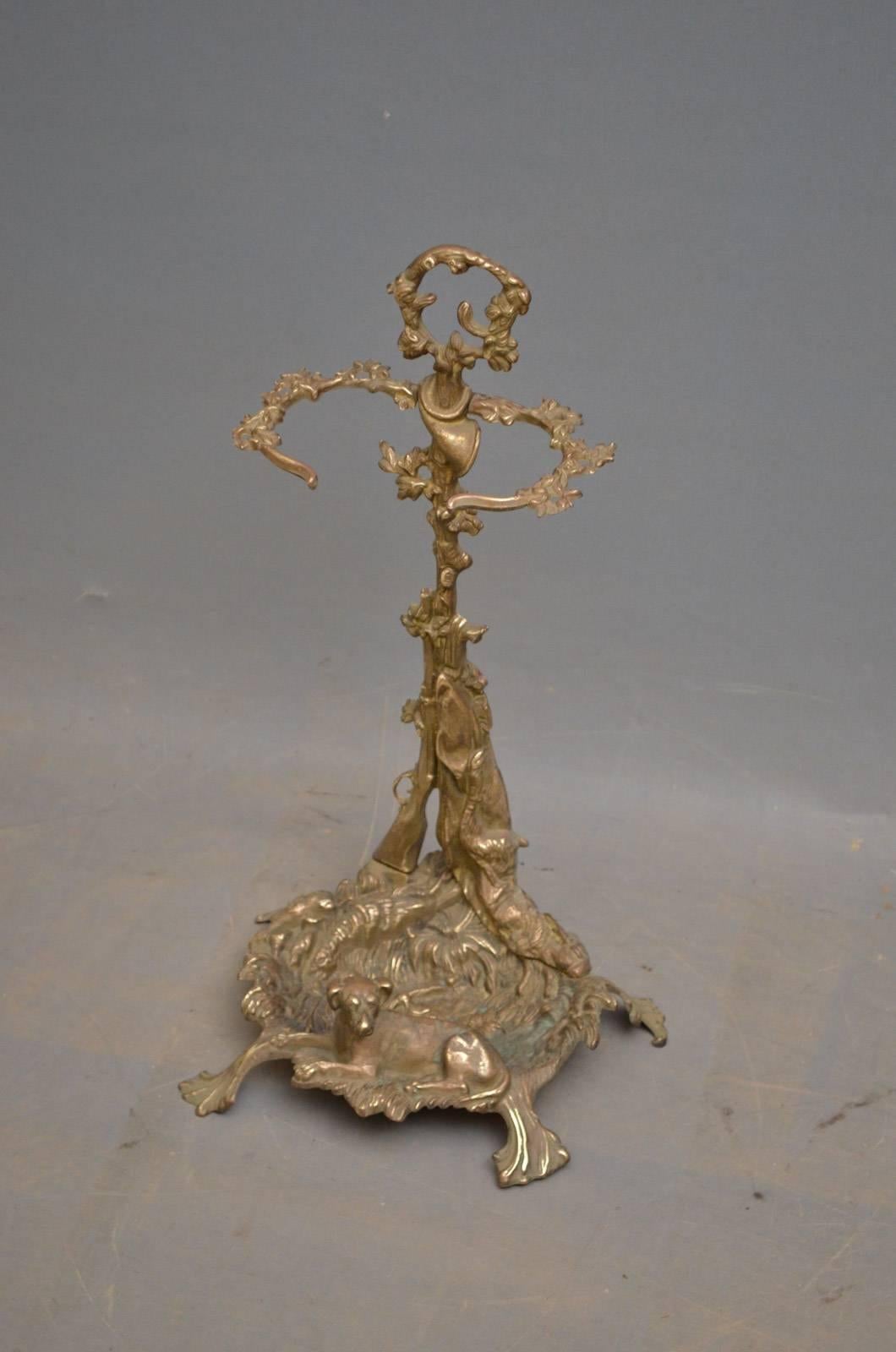 K0295 early 20th century brass fire irons Stand with original tongs, shovel and poker, the stand depict hunting scene with a dog and a hare, all in excellent condition ready to place at home. This antique stand would make a good umbrella and stick