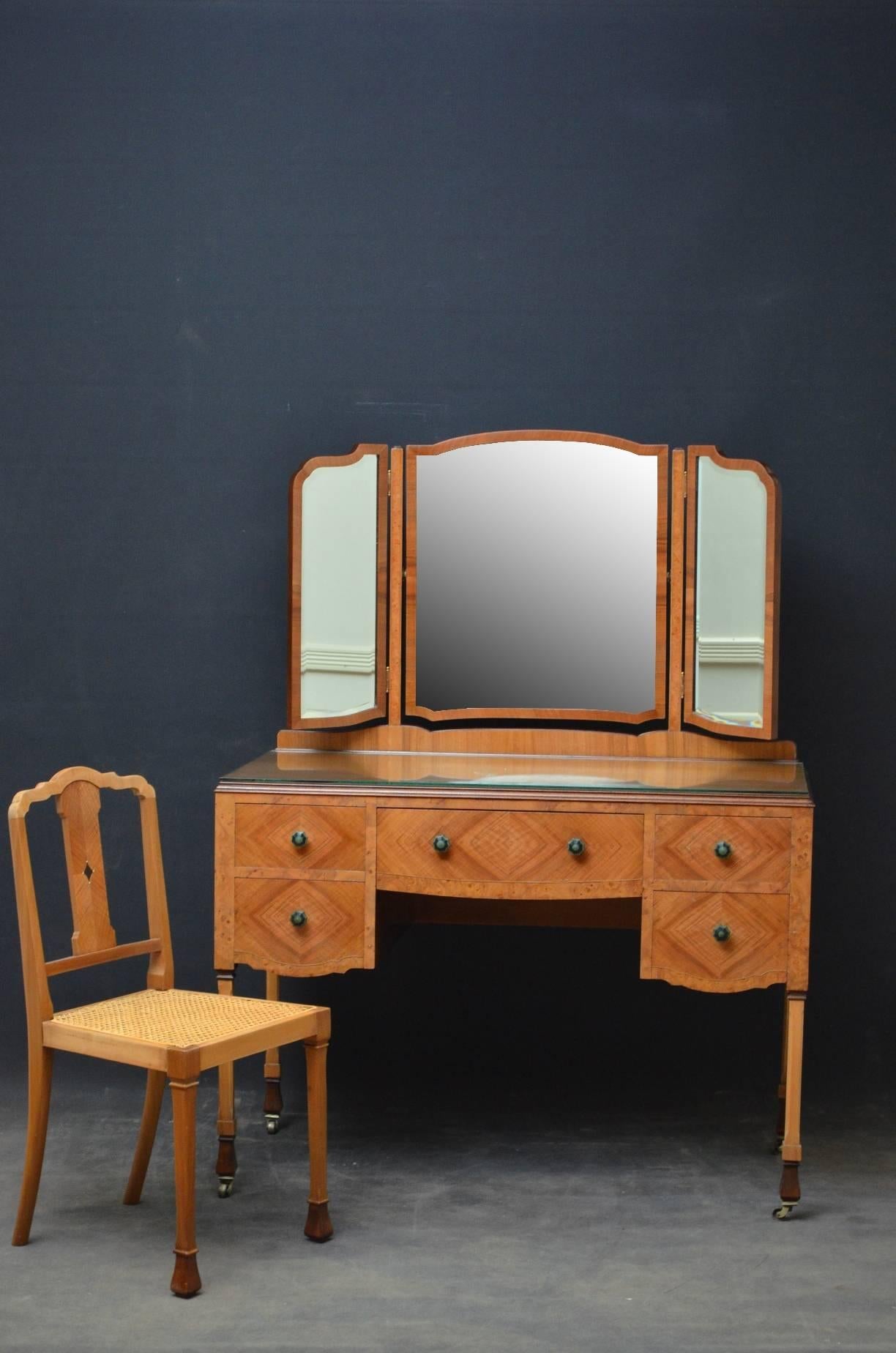 K0118, Stylish and very elegant, Art Deco, figured and burr walnut dressing table with matching chair, having shaped bevelled edge mirror with two side mirrors on tapered burr walnut supports, stunning figured walnut moulded top (with glass for