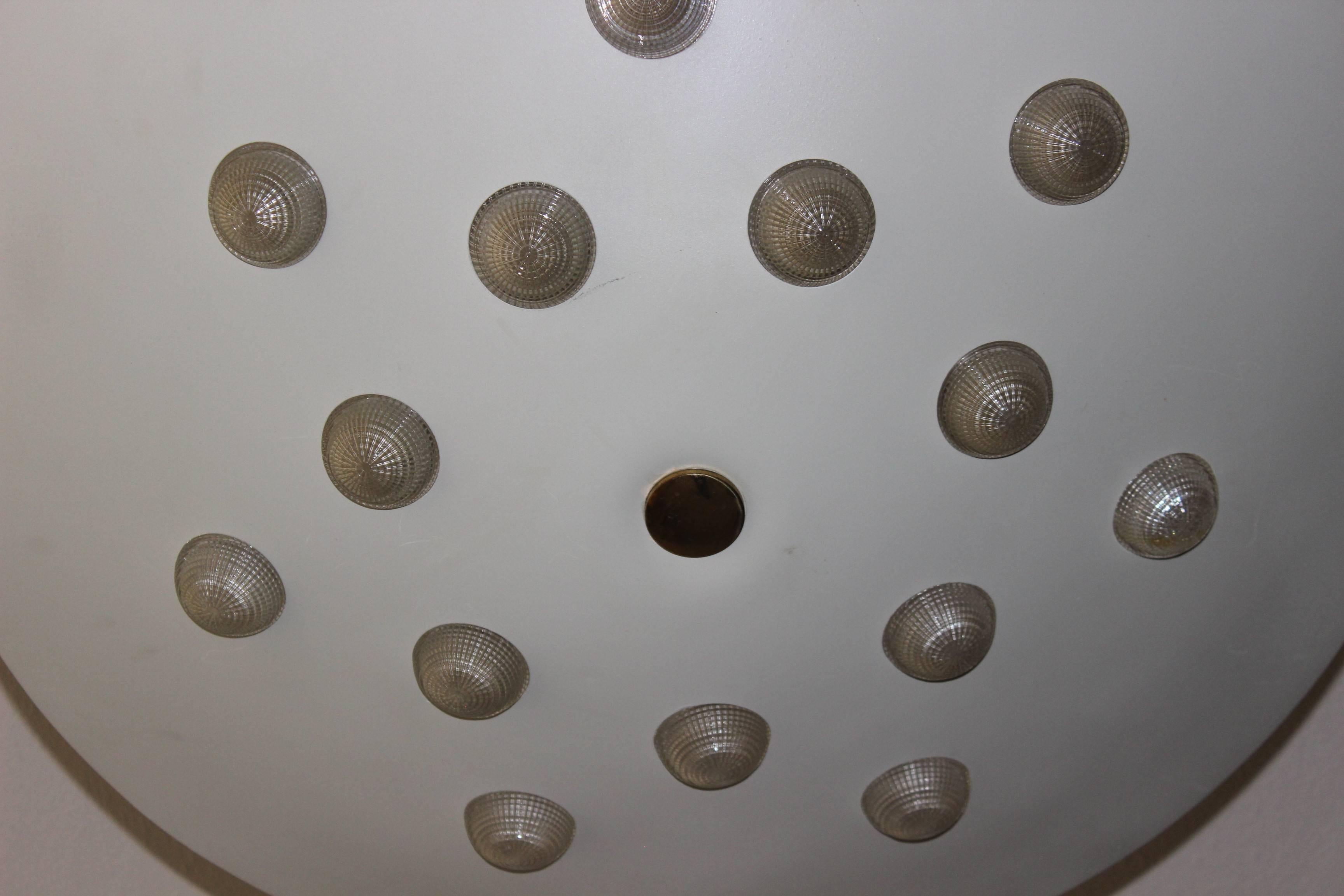 Beautiful large Stilnovo chandelier,

Stilnovo was a Mid-Century Modern design collective company where various artist did work for u can also call it a movement or a period.

This ceiling light looks like a UFO, and the white paint is still