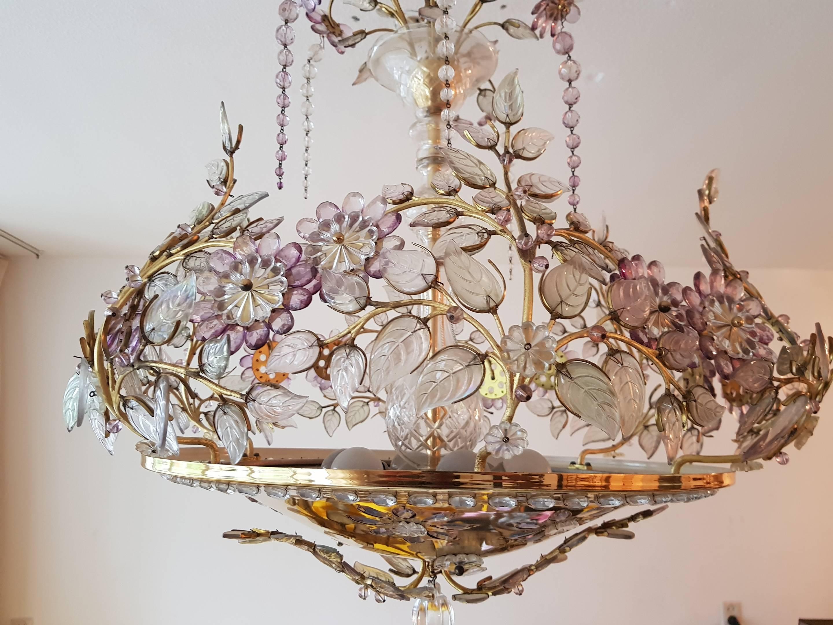 Beautiful Maison Bagues style chandelier made in France, 1950s.

Baguès was born in Auvergne circa 1840 and became famous internationally as a creator of art lighting. In the beginning it specialized in liturgical bronze and the company quickly