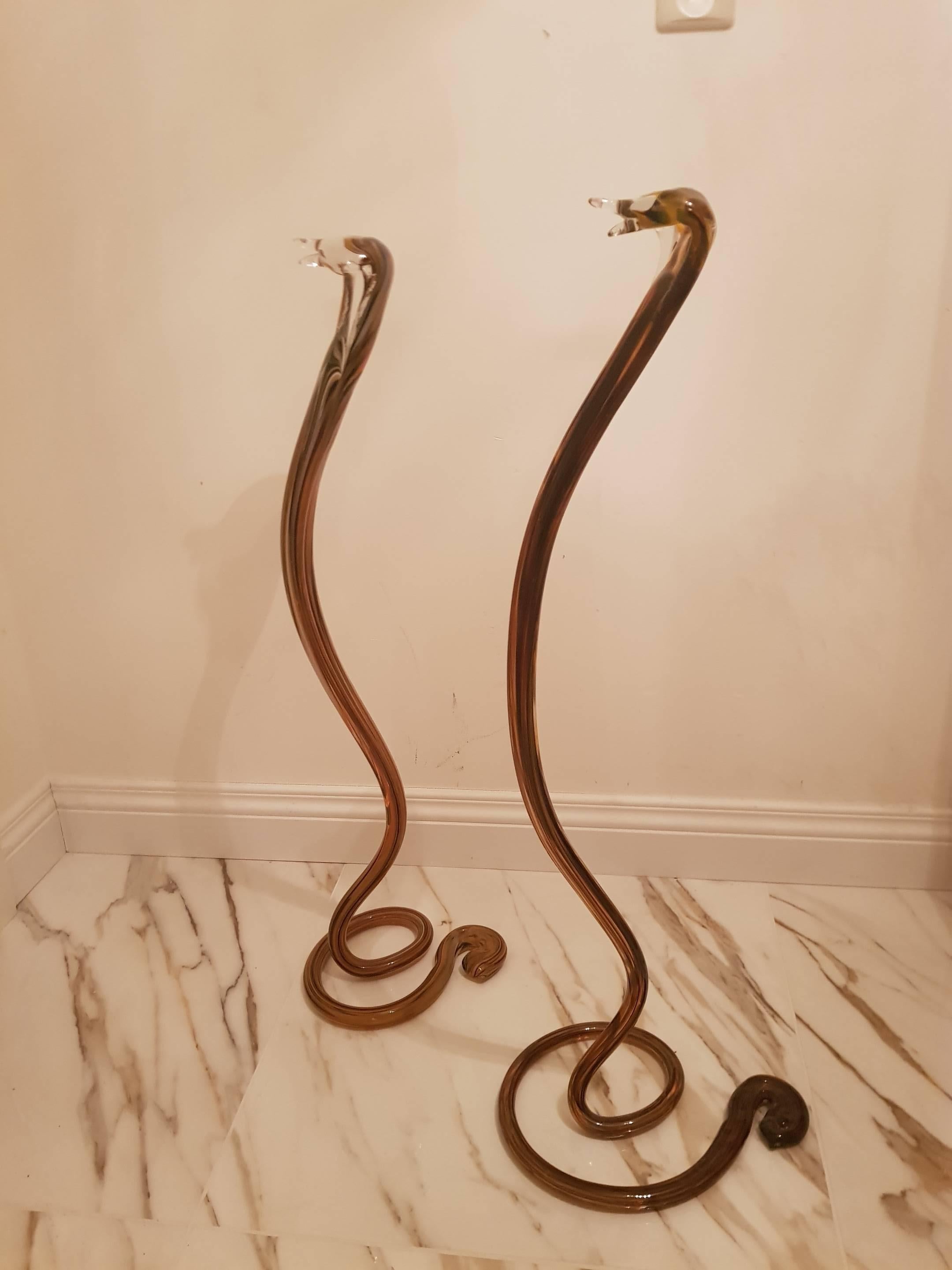 Two Murano cobras handblown and perfectly shaped to a cobra, one slightly bigger but a great pair. Unique interior items!
Dimensions:
90cm high, 25cm width, 30cm depth.
88cm high, 22cm width, 24cm depth.