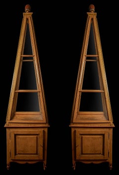 A pair of Belle Epoque polychrome-painted obelisk display vitrines, circa 1900