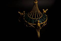 Intricate Art Deco round ironwork table with birds and leaf motif, 20th century