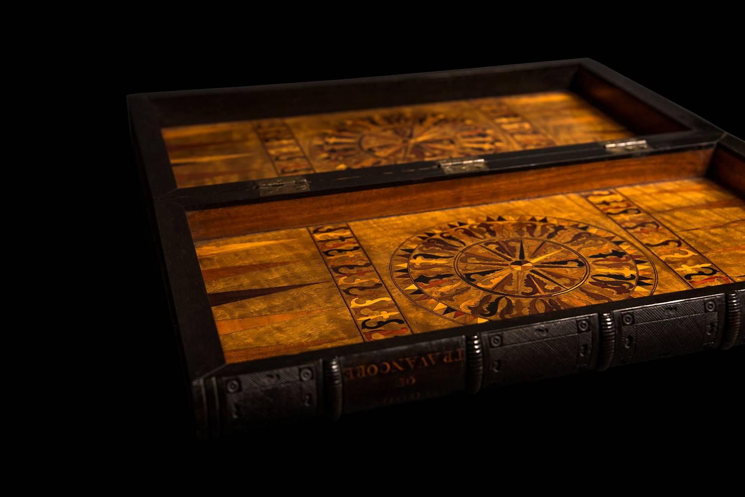 A wonderful collectable piece, the perfect addition to a gentleman's library.

Beautiful parquetry geometric inlay. Made of various exotic timbers from the wood native to 'Travancore' India. This is charmingly carved into the side of the box in