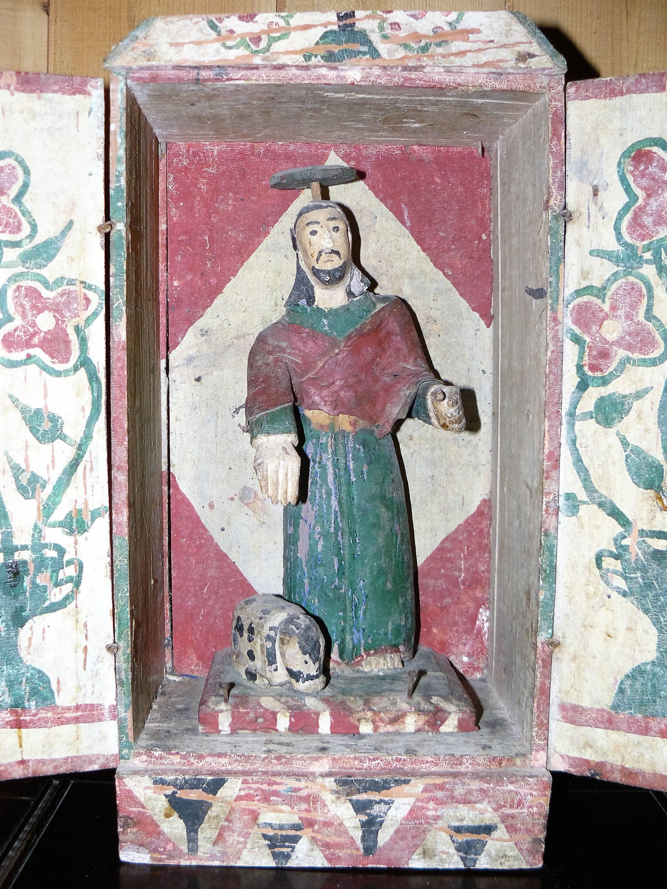 Charming altar box of Saint Roch, Mexican art in wood painted with good patina.
     
    