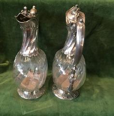 19th Century Pair of Cut Crystal Ewers Set in Silver Lapar Claret Jug