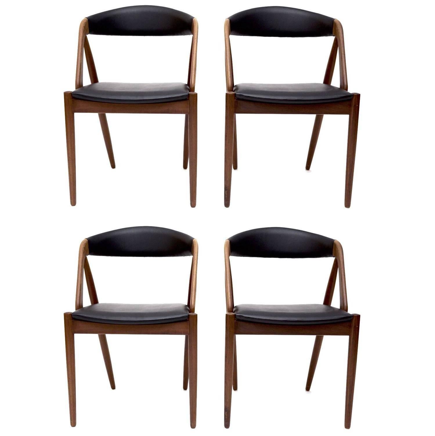 Six classic chairs by Kai Kristiansen. The unique model 31 is a beautiful chair with deep curved backrest that provides great comfort. 

The frames are made of teak and seats and backrests are professionally reupholstered.

Each chair has been