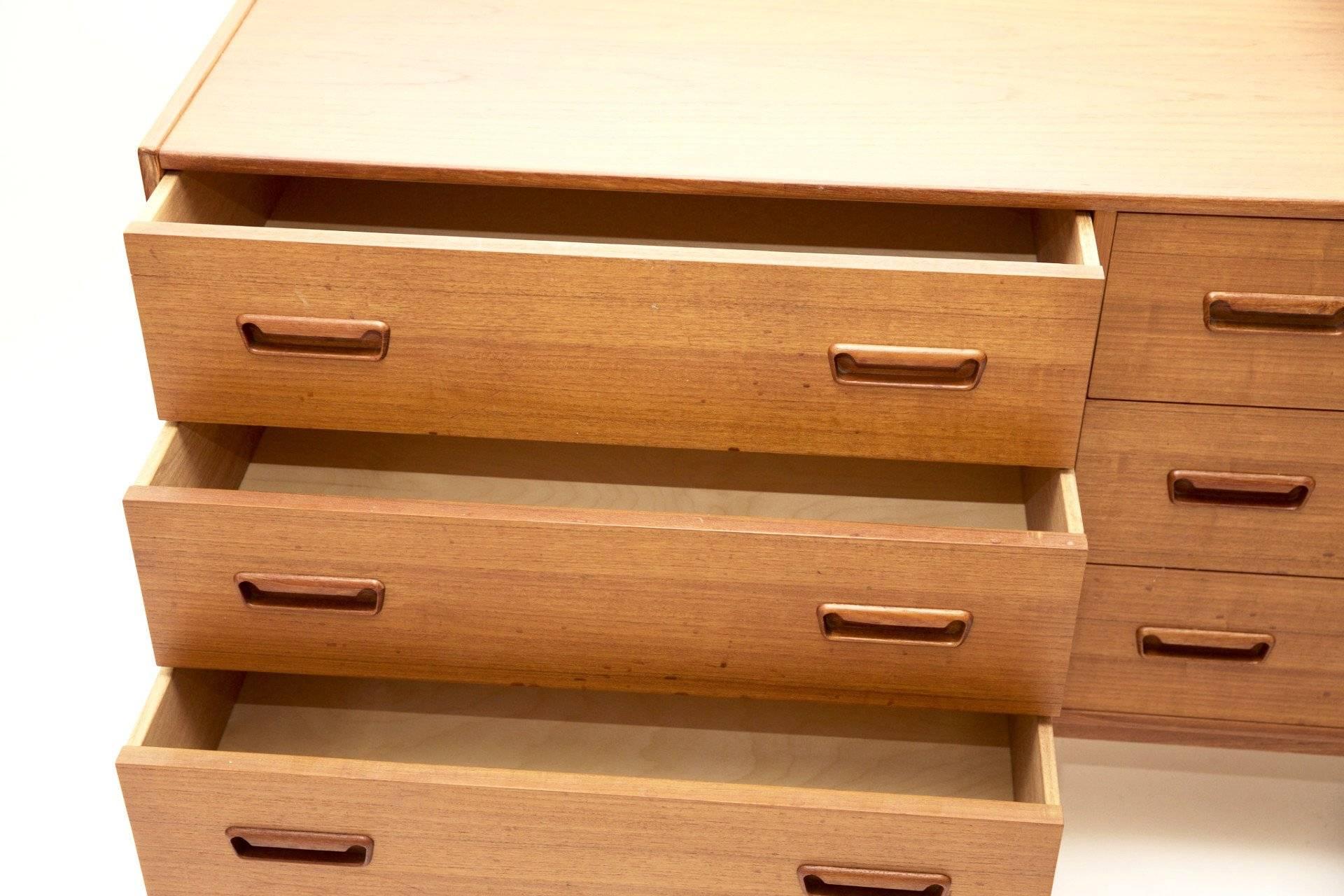 This Danish teak cabinet is a sideboard in disguise. It comes with six drawers.