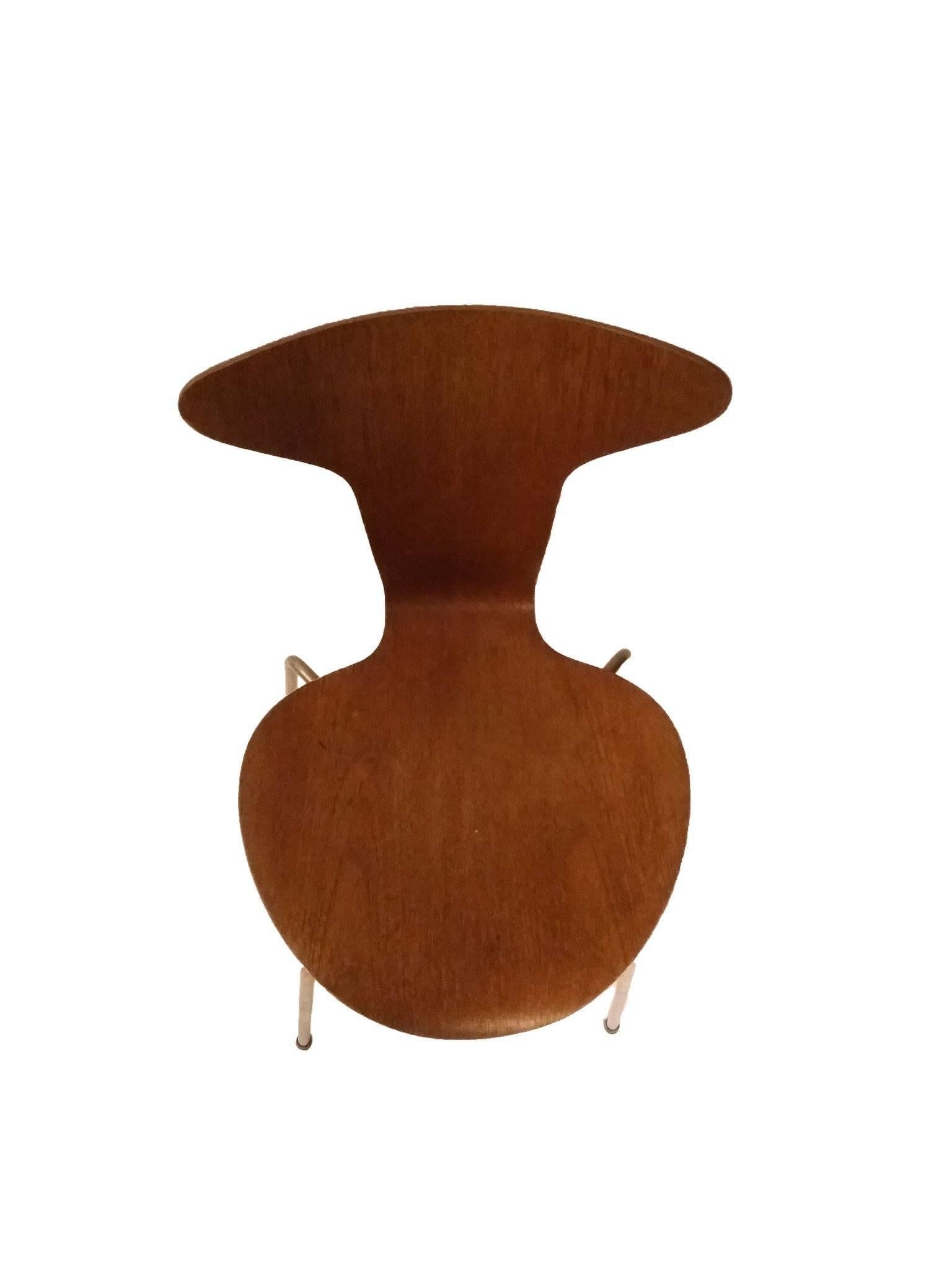 This chair is known as the Mosquito chair and designed by Arne Jacobsen for Fritz Hansen. It is the 1955 Munkegaard chair and it is originally designed for the school located in Gentofte, in the north of Copenhagen.

We have three chairs in great