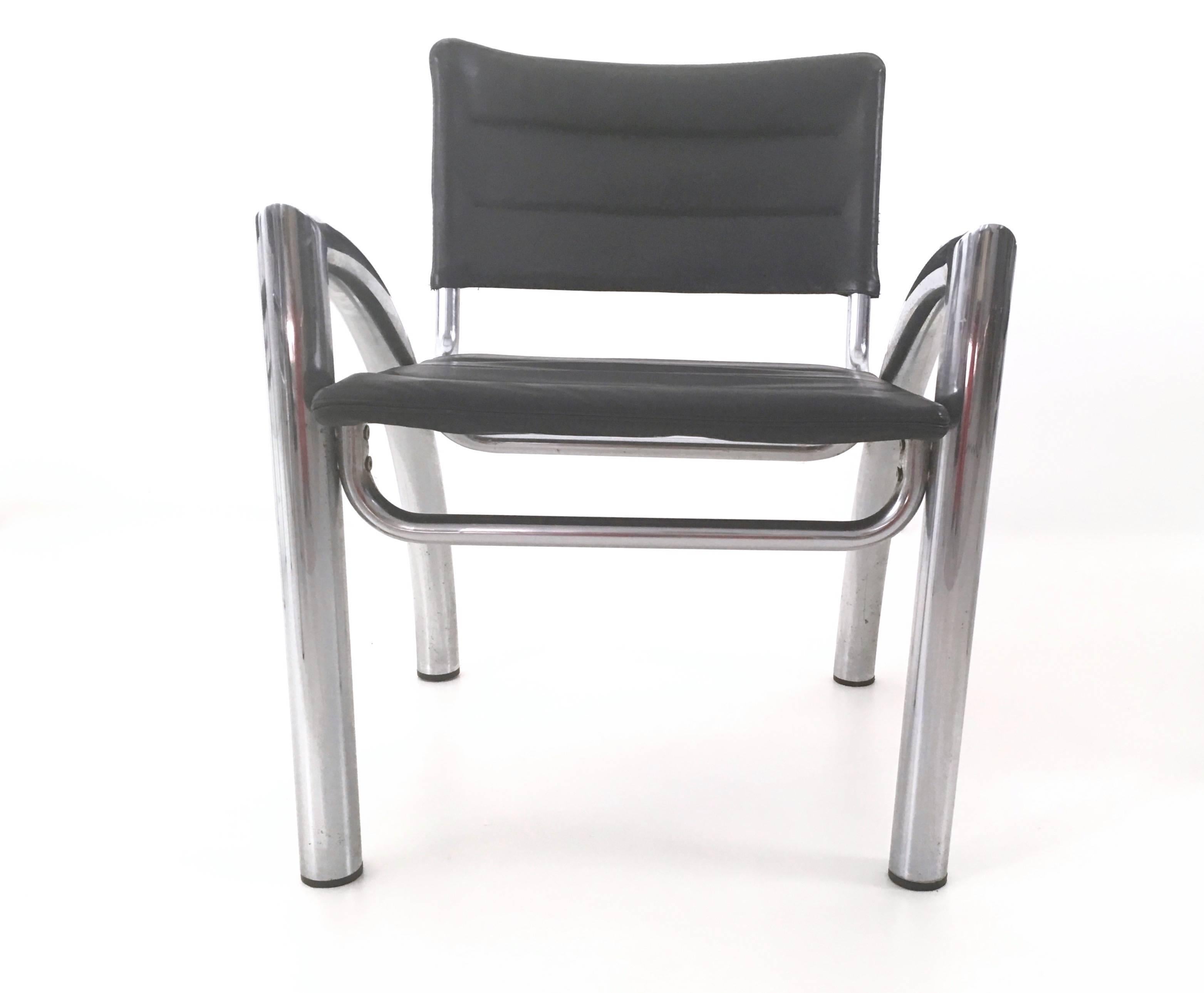 These chairs feature chromed metal frames and leather seats.
They are vintage, therefore they might show slight traces of use, but they can be considered as in very good original condition and ready to become a piece in a home. 

Measures: Width: