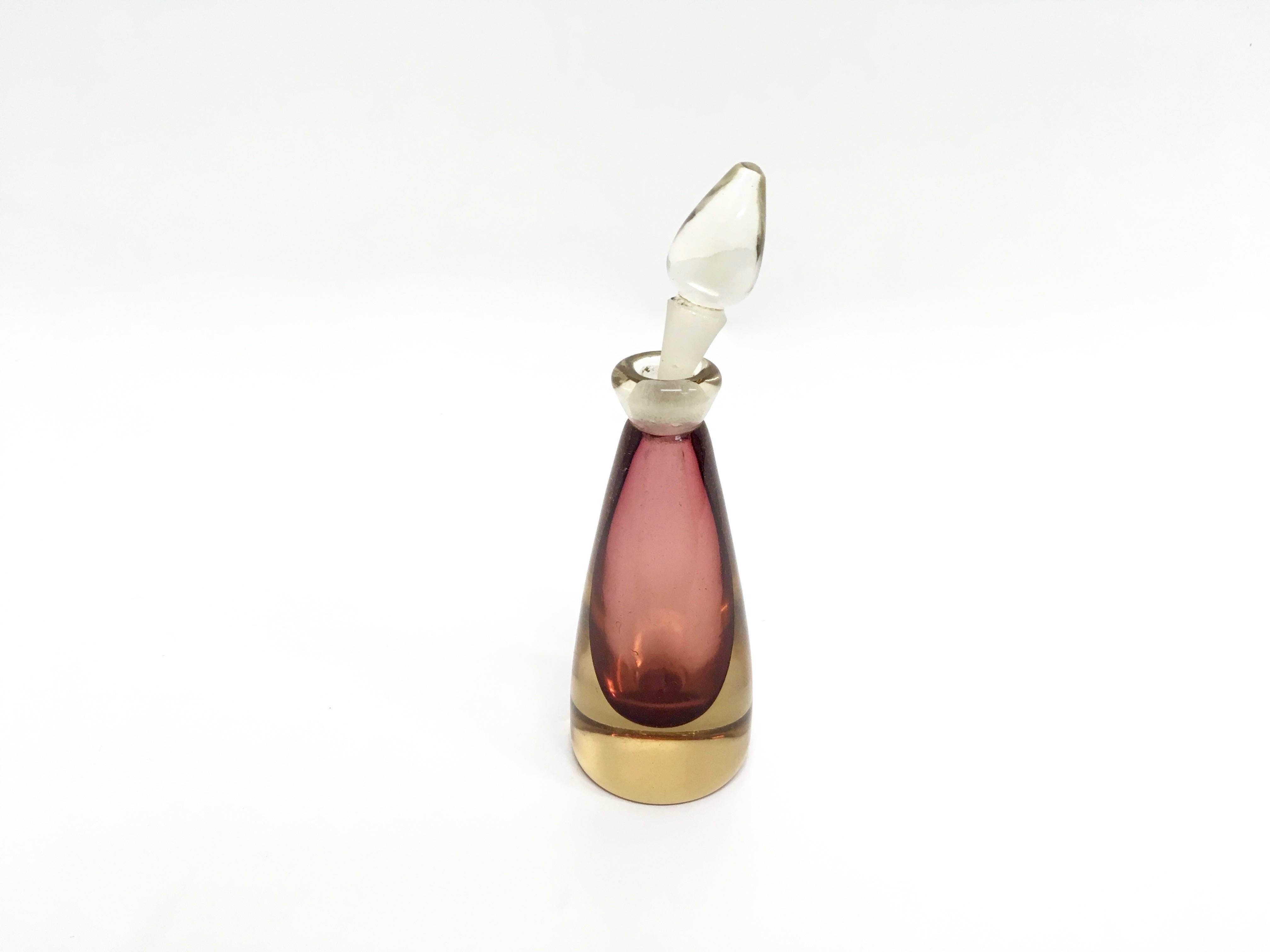 This is a 1950s perfume bottle by Seguso. 
Made from Murano glass. 
In perfect condition.
 