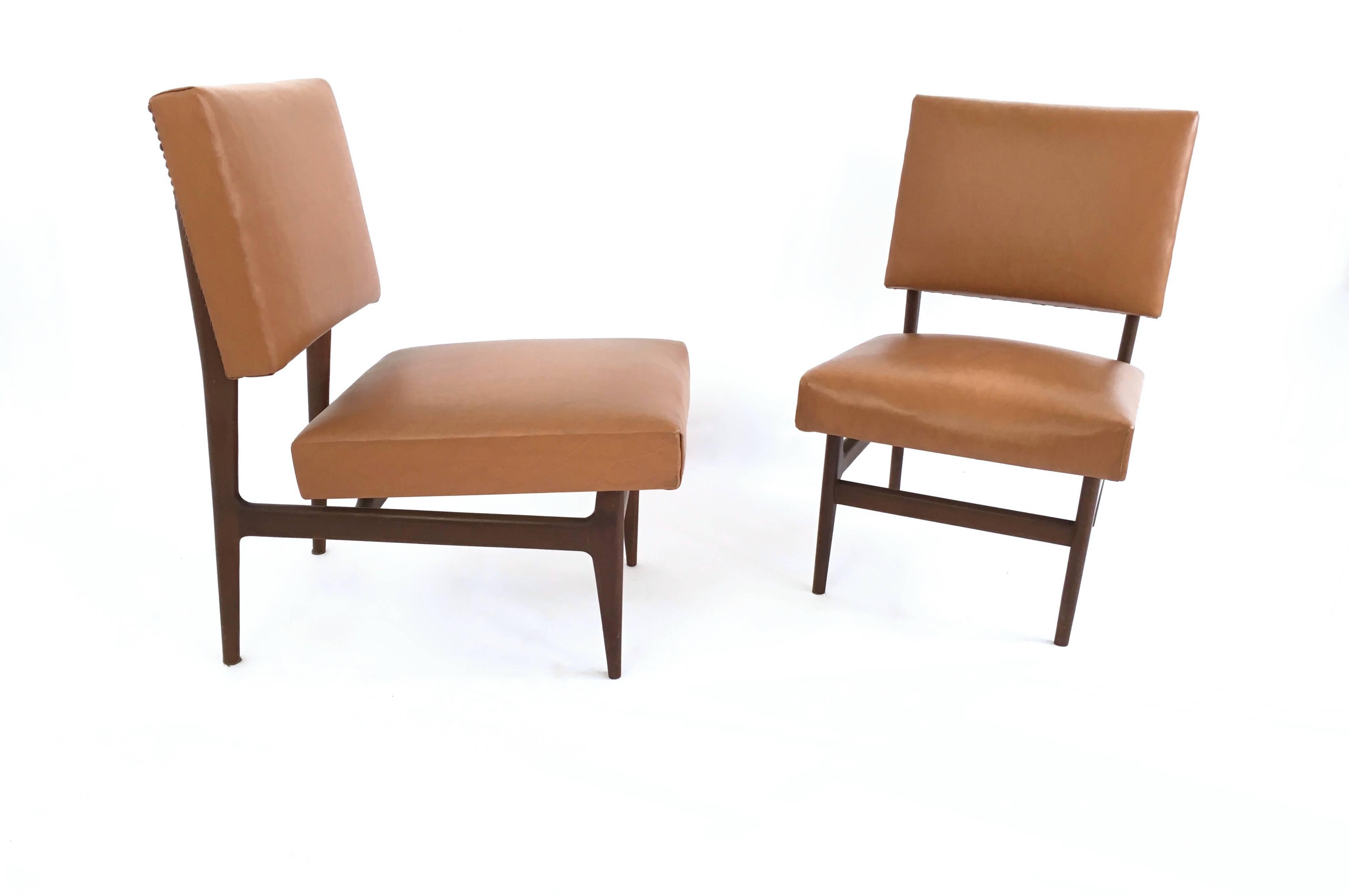 Made in Italy, 1950s.
They are upholstered and covered in skai and feature an ebonized beech structure.
These are vintage pieces, therefore they might show slight traces of use, but they can be considered as in very good original