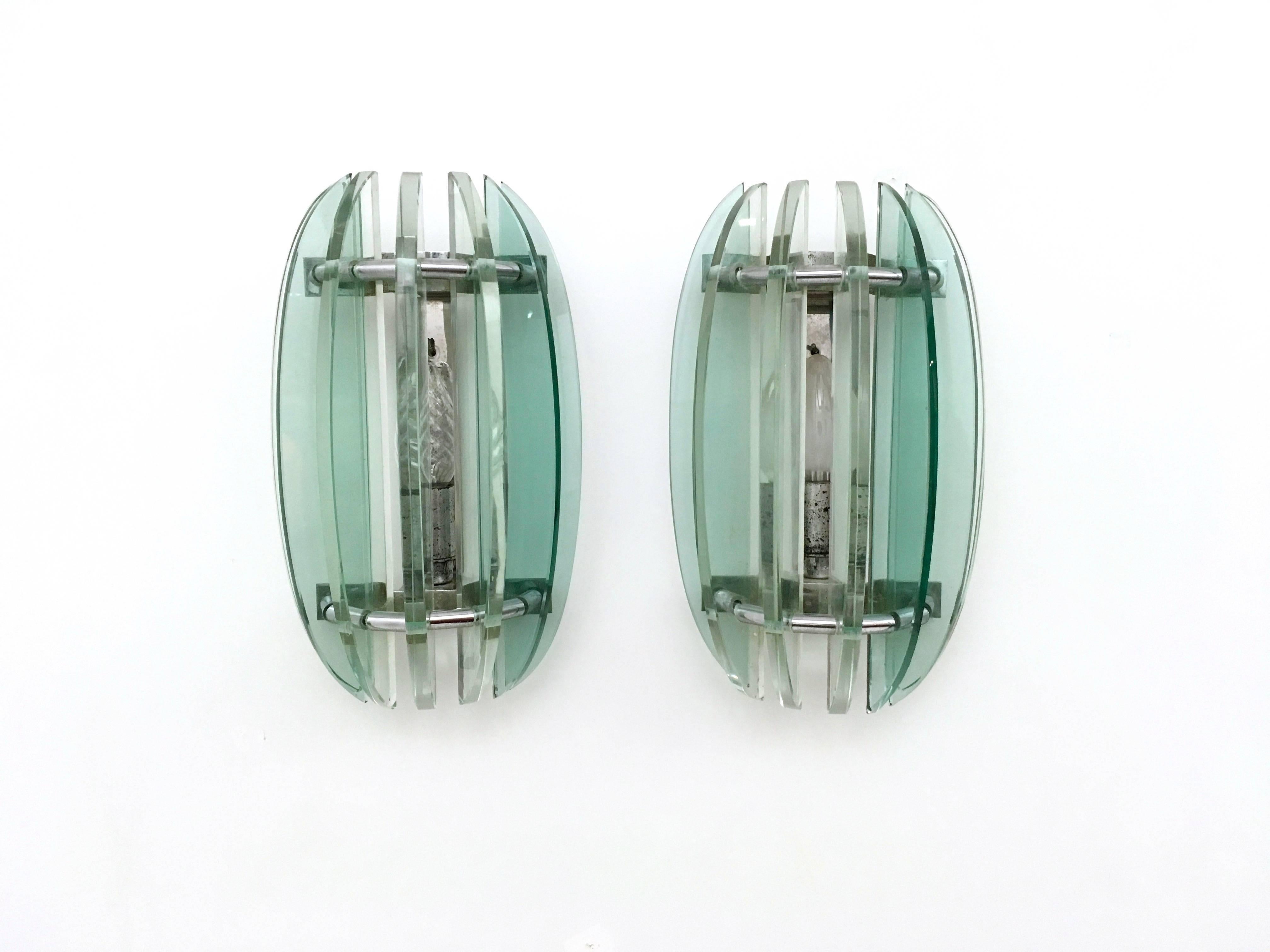 Pair of sconces by Veca, 1970s. Made from glass.