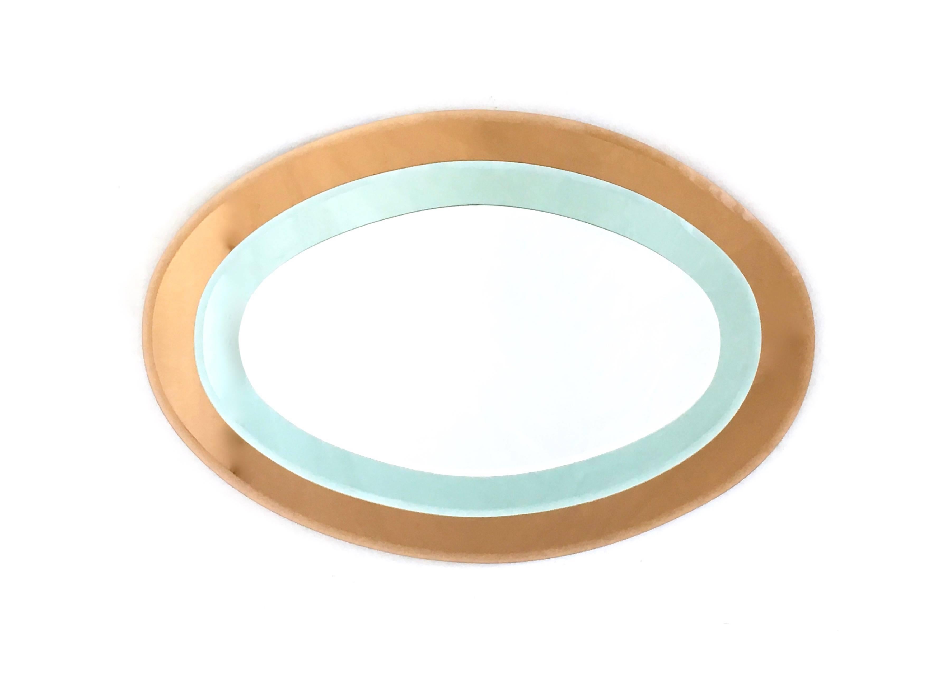 It can be used both horizontally or vertically.
It features three different mirrors in different colors: Silver, bronzed rose and teal.
In perfect vintage condition.
