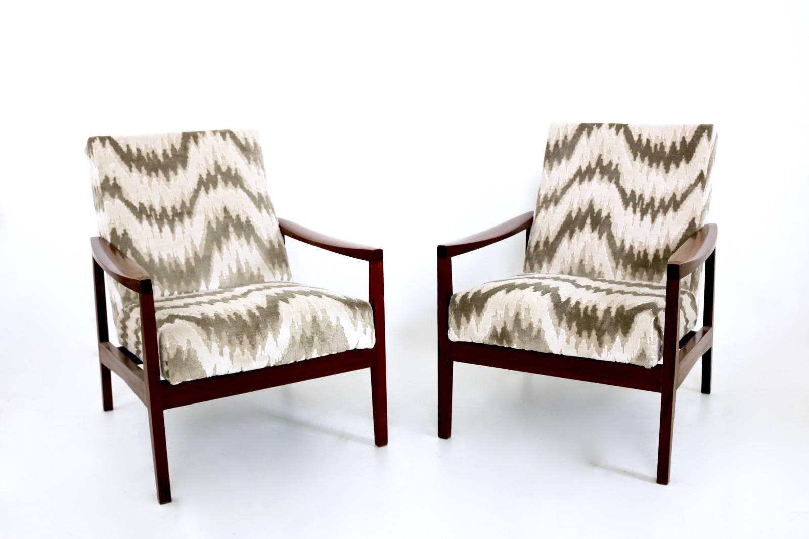 Italy, 1950s. 
They feature a wooden frame and a new fabric upholstery. 
These armchairs are vintage, therefore they might show slight traces of use, but they have been recently upholstered and can be considered as in excellent