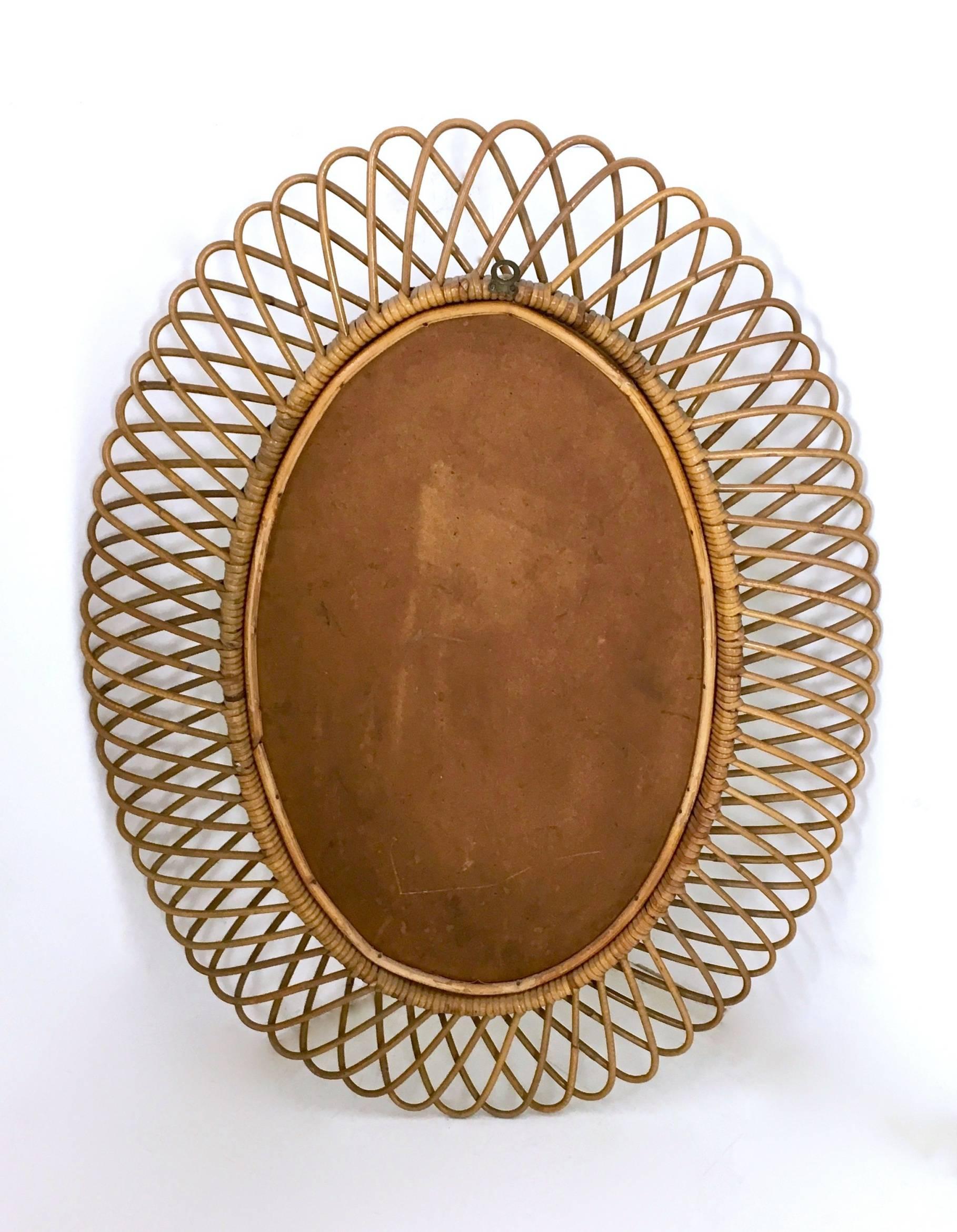 Made in mirror and wicker. 
In perfect condition.