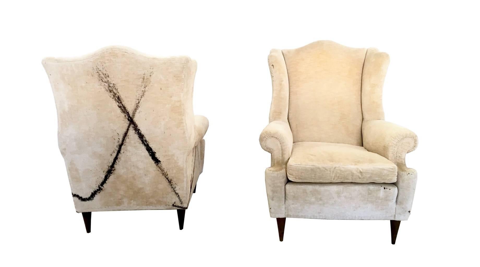 Made in Italy, 1950s.
These armchairs are upholstered in beige velvet and feature a black painted cross.
They are vintage, therefore they might show slight traces of use, but they can be considered as in very good original condition.

Measures: