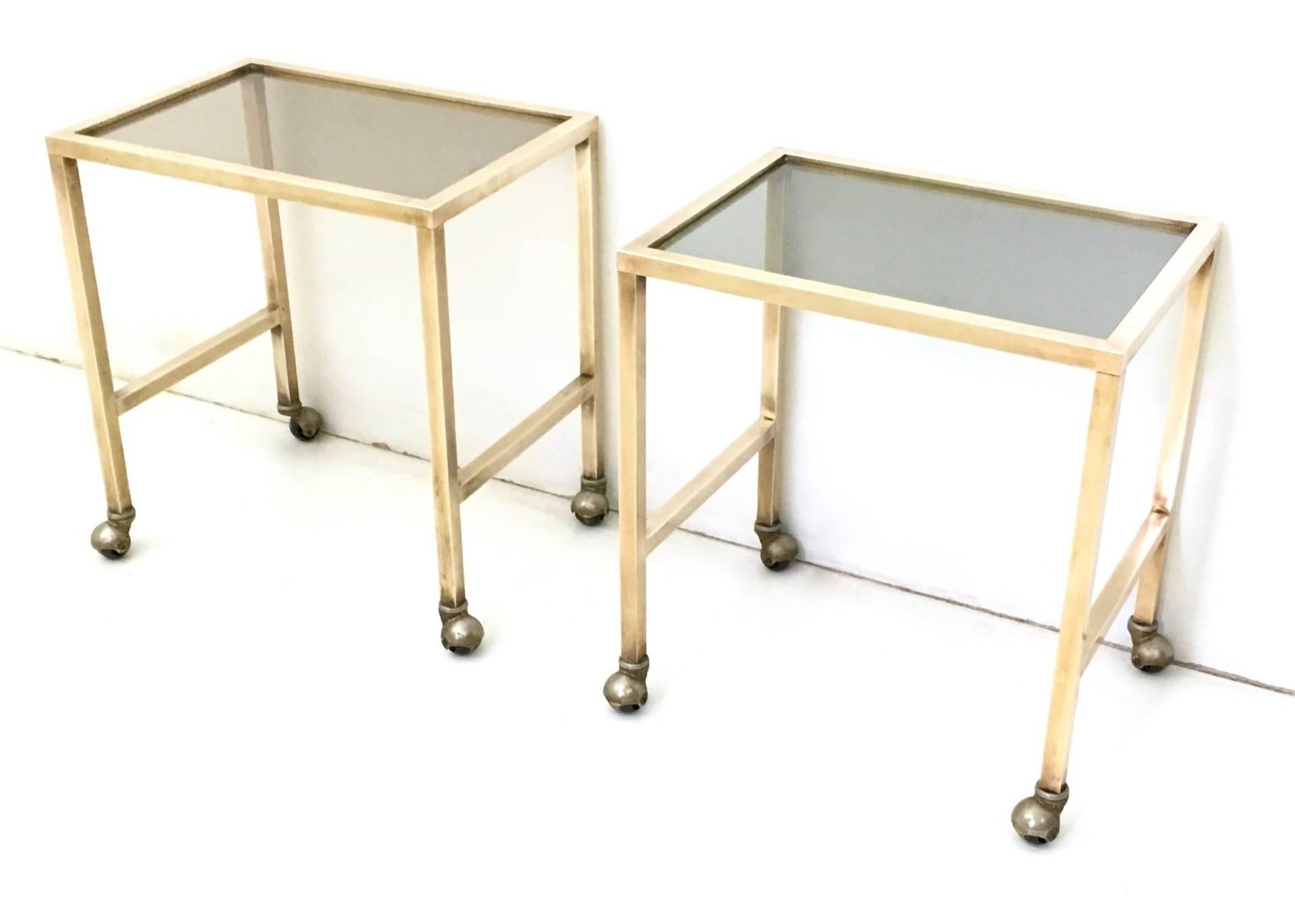 Italian Pair of Brass and Smoked Glass Nightstands on Casters, Italy, 1970s