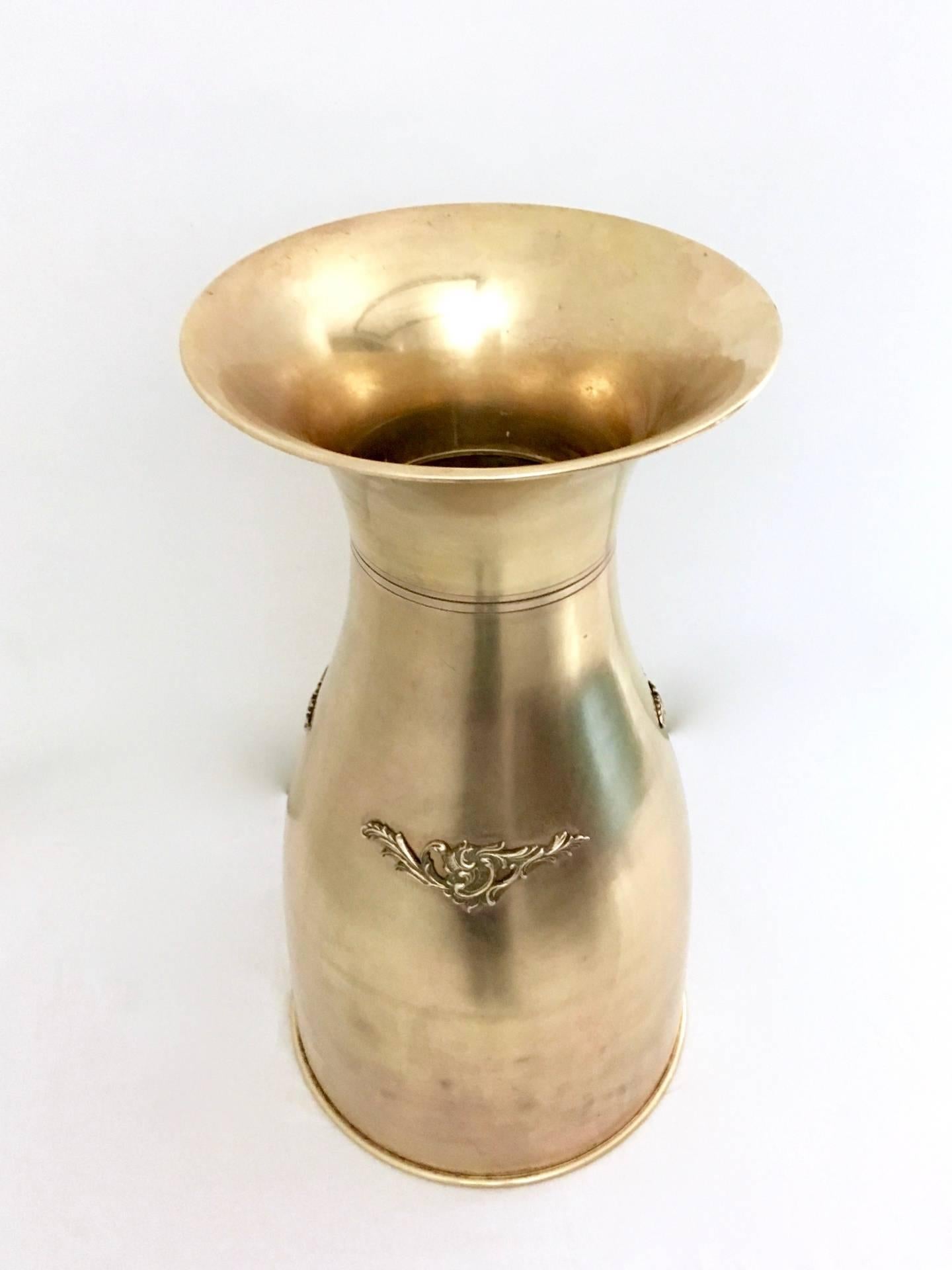 Made in brass.
It is a vintage piece, therefore it might show slight traces of use, but it has been recently polished and can be considered as in good original condition.

Measures: Diameter: 58 cm
Height: 83 cm.