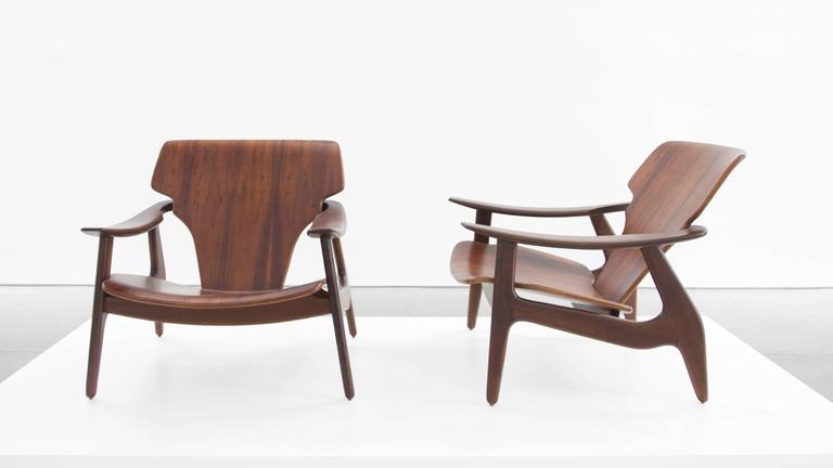 Sergio Rodrigues pair of ‘Diz” chairs made in Imbuia wood with a lacquer finish
Designed by Sergio Rodrigues, for Lin Brasil, 2002.