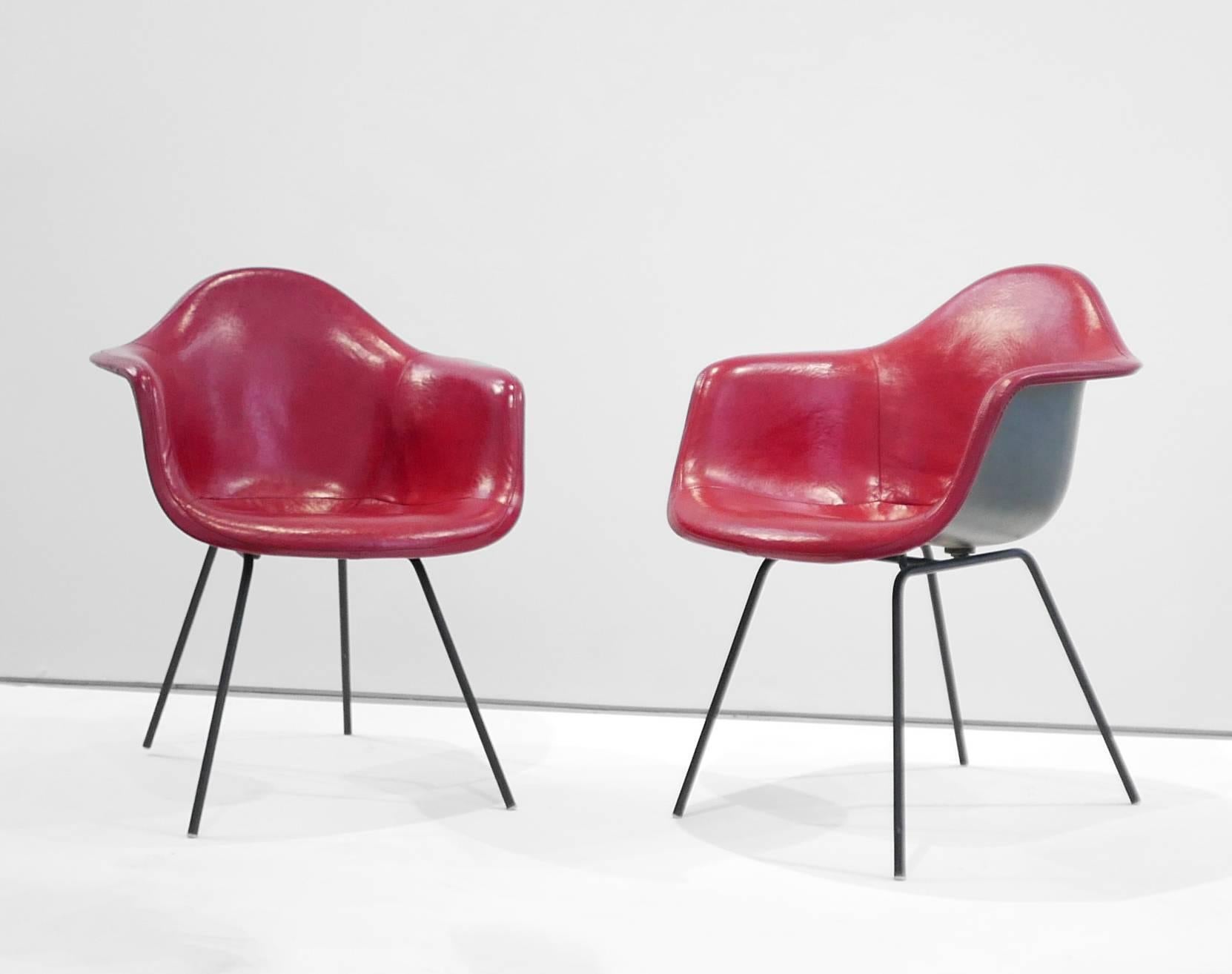 Charles and Ray Eames
Pair of 'DAX' chairs

The DAX chairs were designed by Charles and Ray Eames and was manufactured in the United States by Herman Miller in 1955. It is made from fiberglass and features a black enameled steel base. It belongs