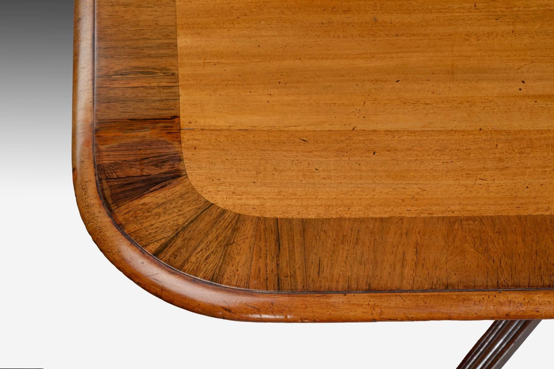 This table is made from Cuban mahogany with the top also being banded in rosewood. The well figured tilt top stands on an elegant base that has a shaped and carved knee that is typical of the work of Gillow. The quality and colour are both very good