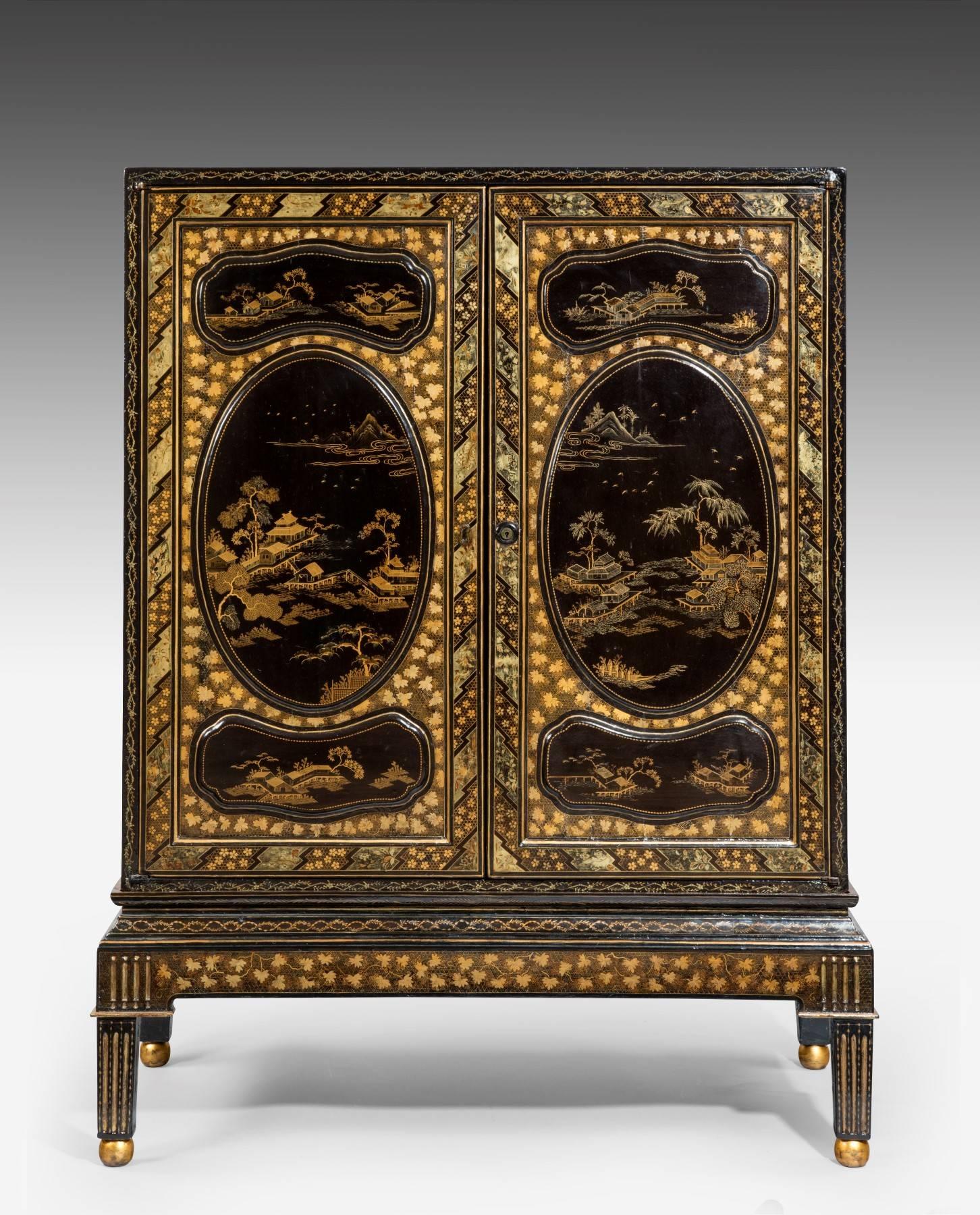 Of simply outstanding quality, this Chinese Export lacquer cabinet is original throughout including the stand to the base. The penwork decoration is simply the best and such is the quality, even the top of the cabinet is decorated. Note should also
