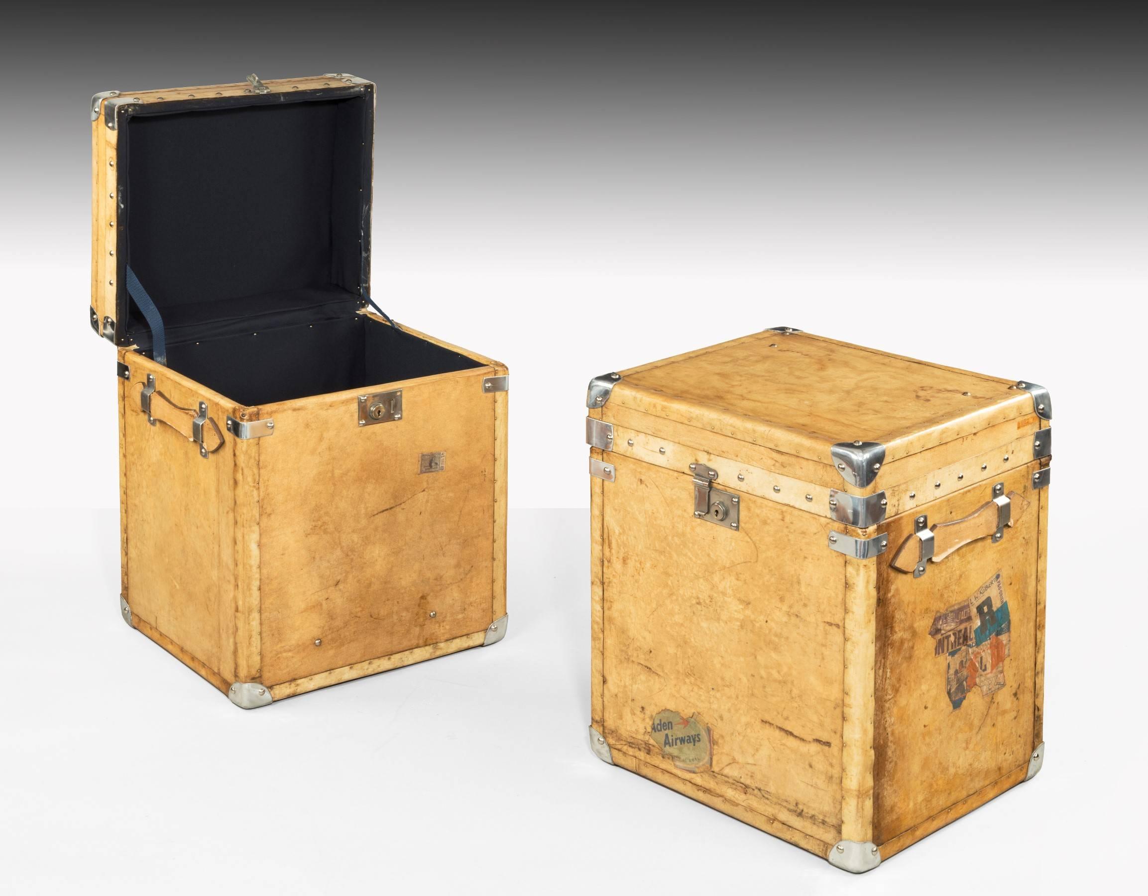 With good style, this pair of vintage luggage boxes are ideal in size and design to act as a pair of unusual end tables. The velum surface has good patination. They are currently in our Hungerford location.