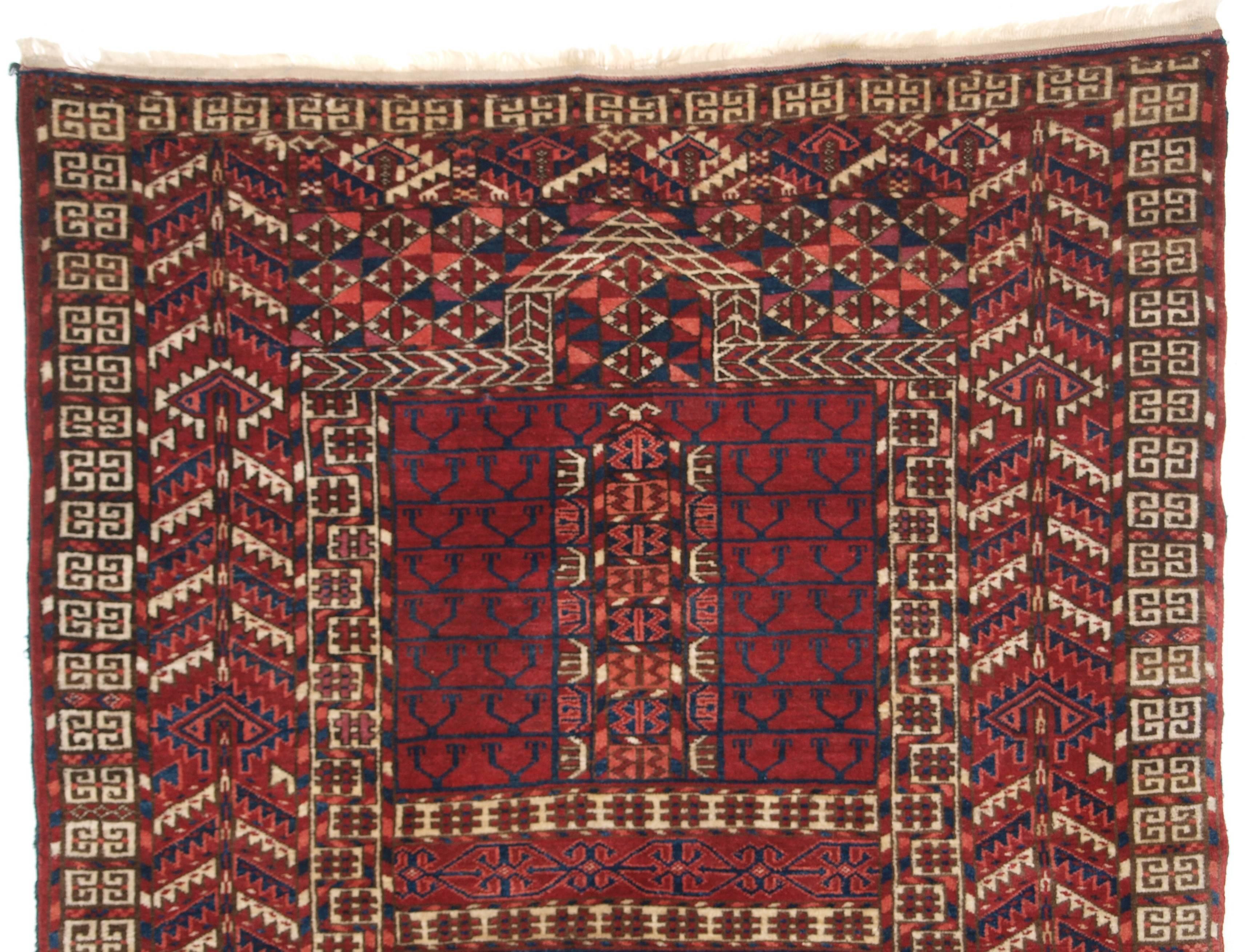 Size: 5ft 0in x 3ft 8in (153 x 113cm).

Antique Tekke Turkmen ensi of traditional design with excellent rich color, 

circa 1900.

Ensi were door hangings used to cover the entrance to a yurt. 

The rug is in excellent condition with only