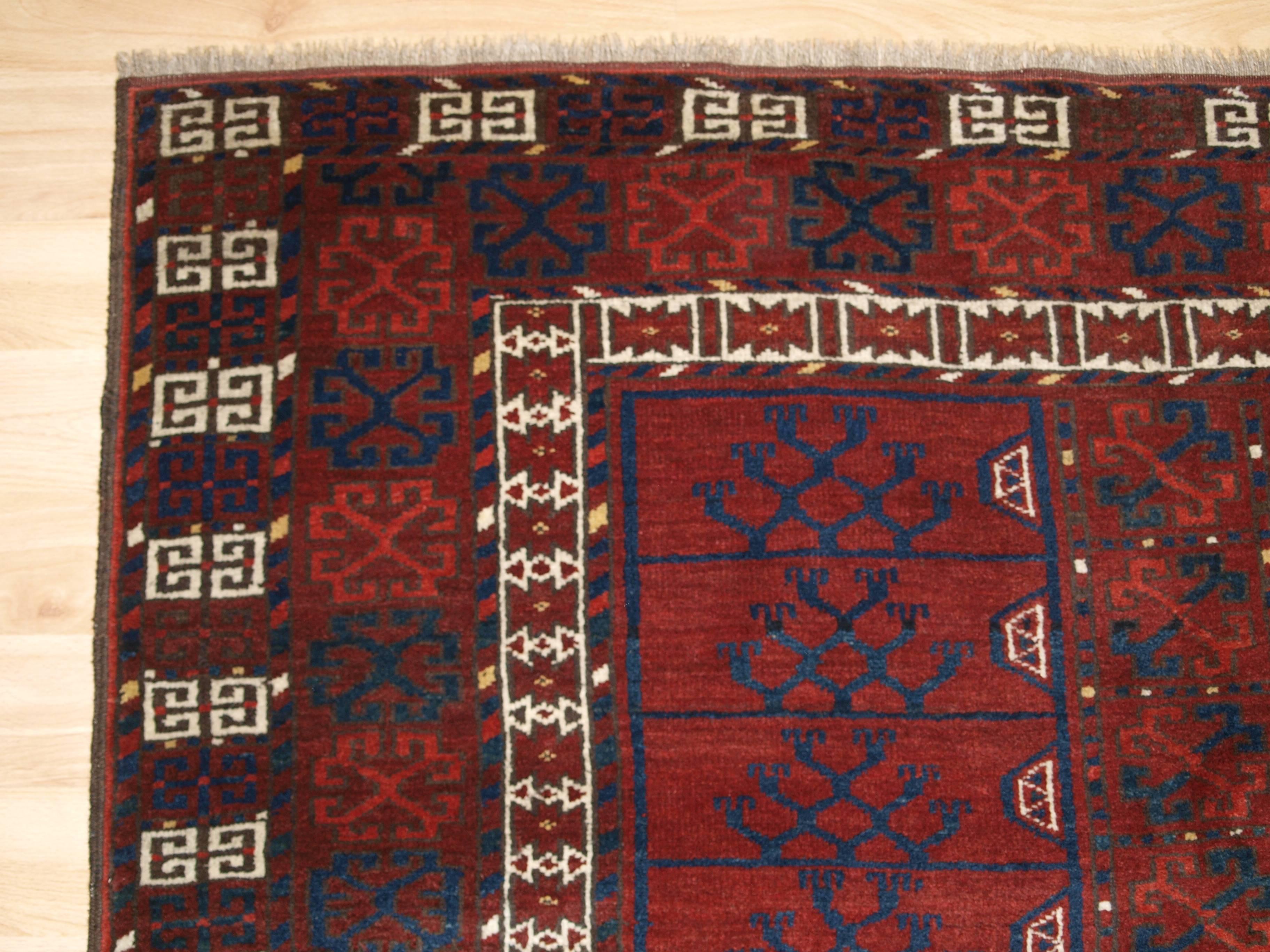Size: 7ft 3in x 4ft 7in (220 x 139cm).

Old Afghan village rug of Ersari Turkmen ensi design. The rug is of Classic design with superb color.

circa 1900-1920.

The rug has excellent deep rich red colour to the central panels with blues and