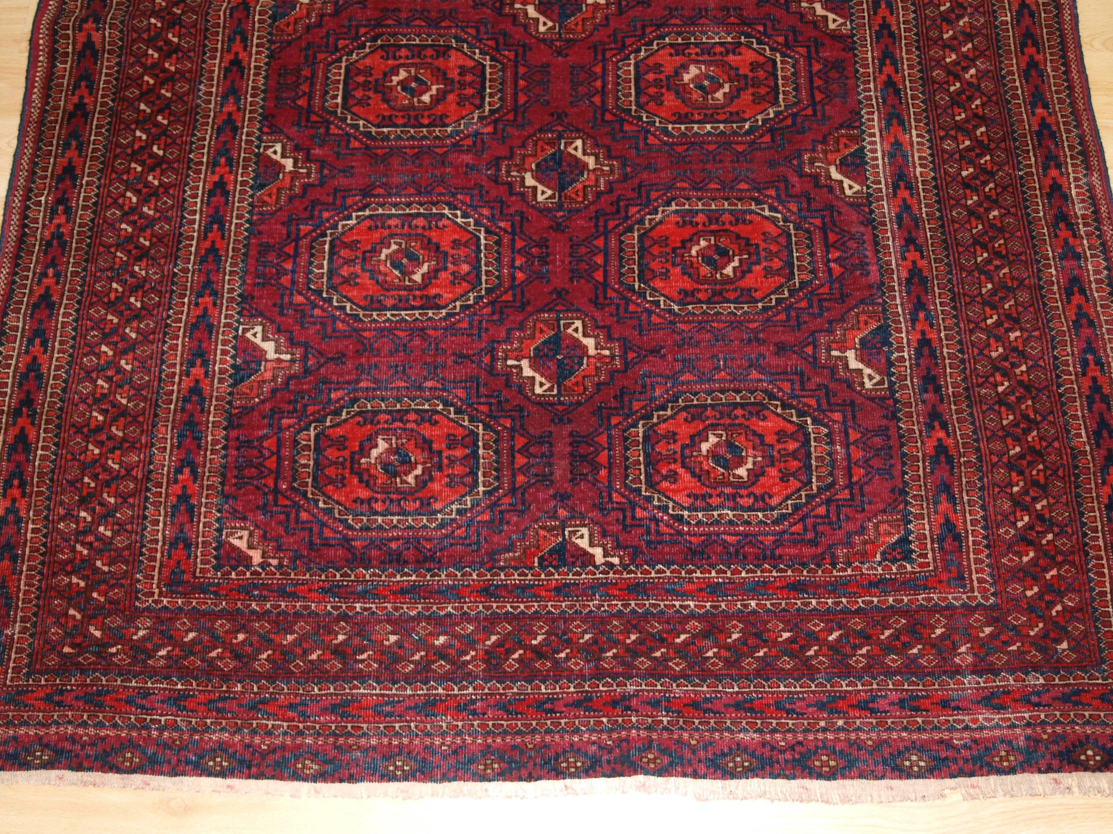 Early 20th Century Antique Tekke Turkmen Rug of Small Size, with Fine Weave, Cochineal Color For Sale