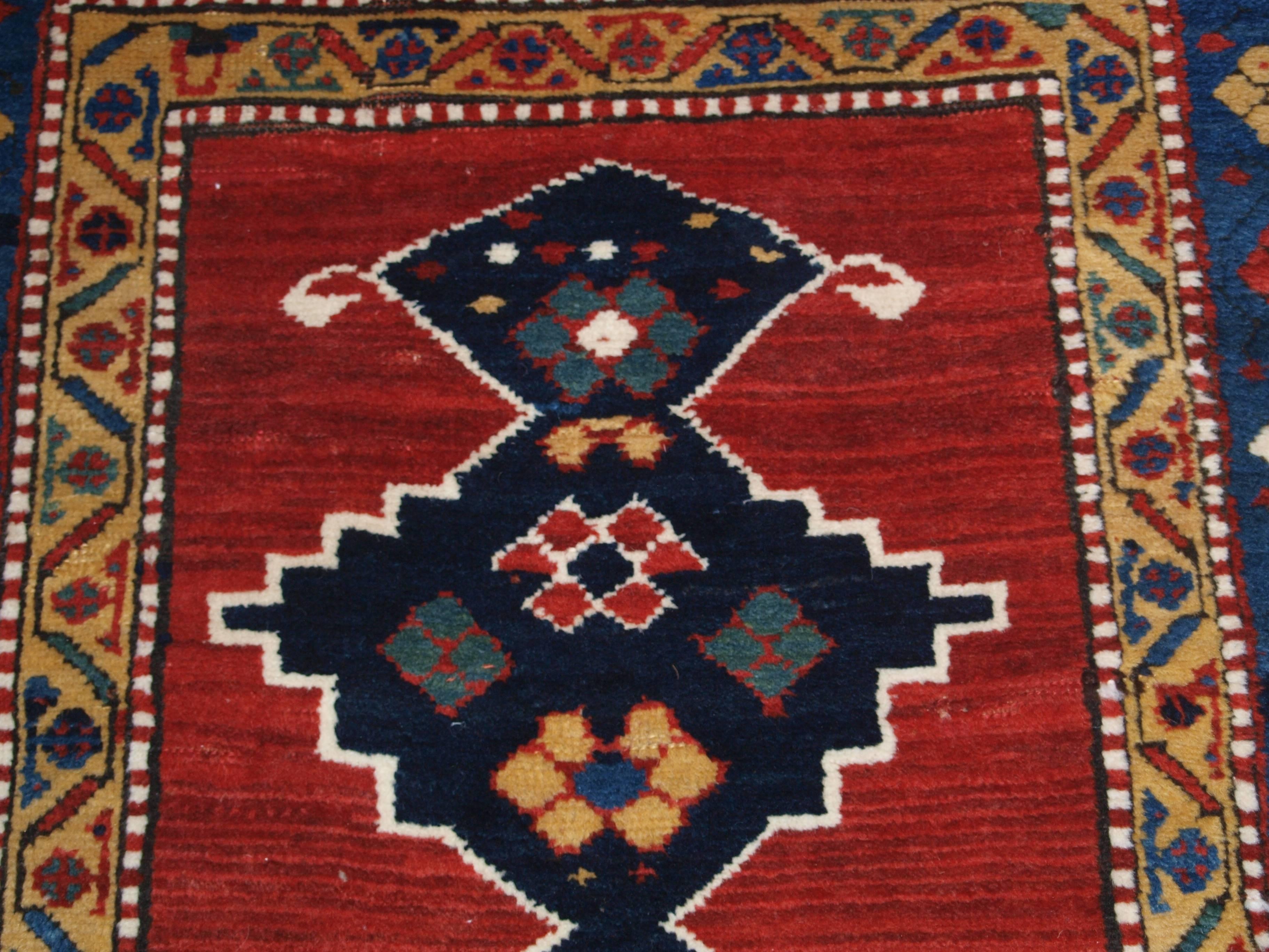 Antique Caucasian Kazak Rug with Linked Medallion Design For Sale 2