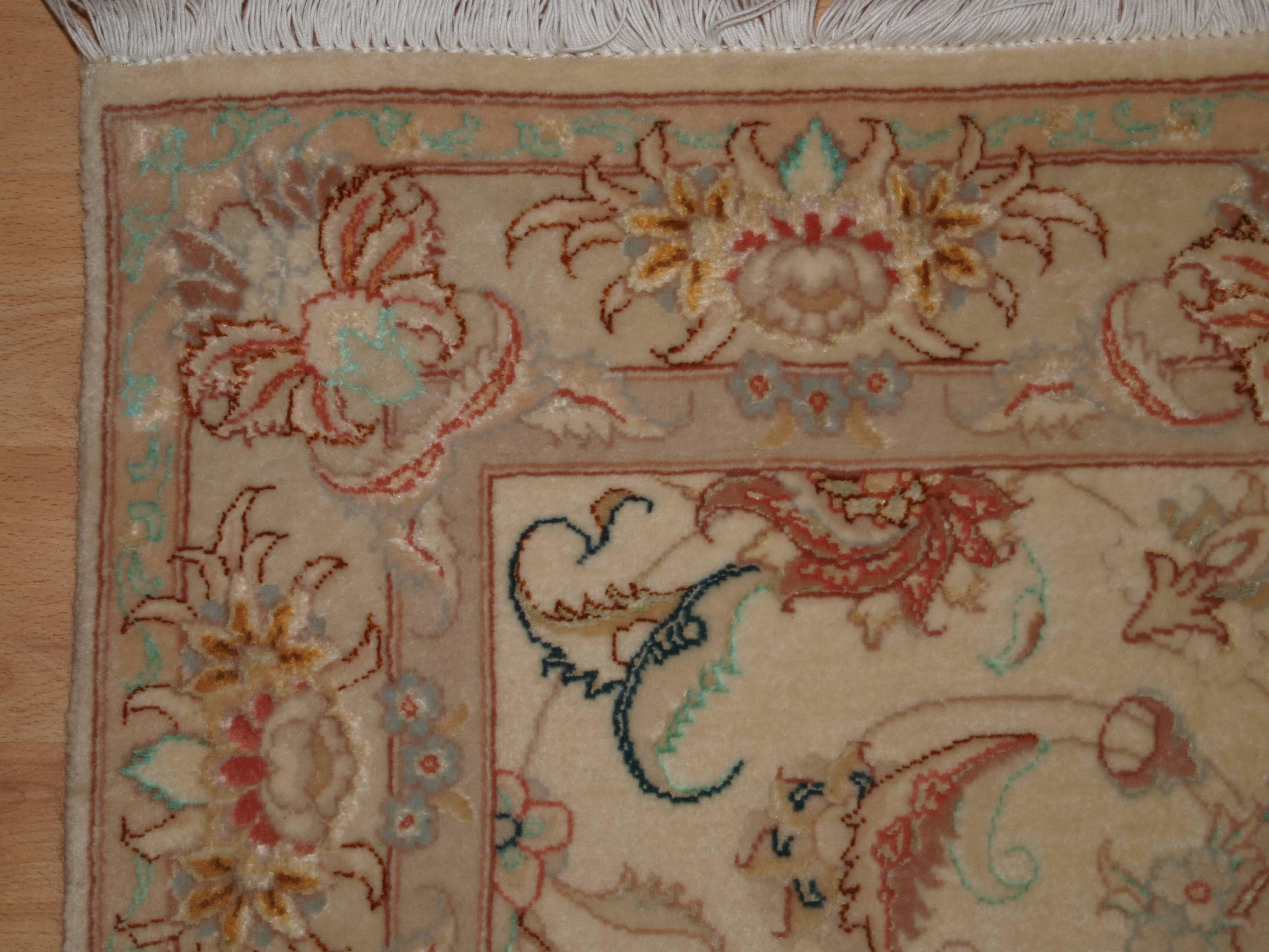 Persian Tabriz runner, fine wool and silk, soft pastel colors, perfect condition.
Size: 10ft 2in x 2ft 9in (310 x 84cm).

Very fine hand-knotted Persian Tabriz runner in lambs wool and silk.

The runner is about 5-10 years old but