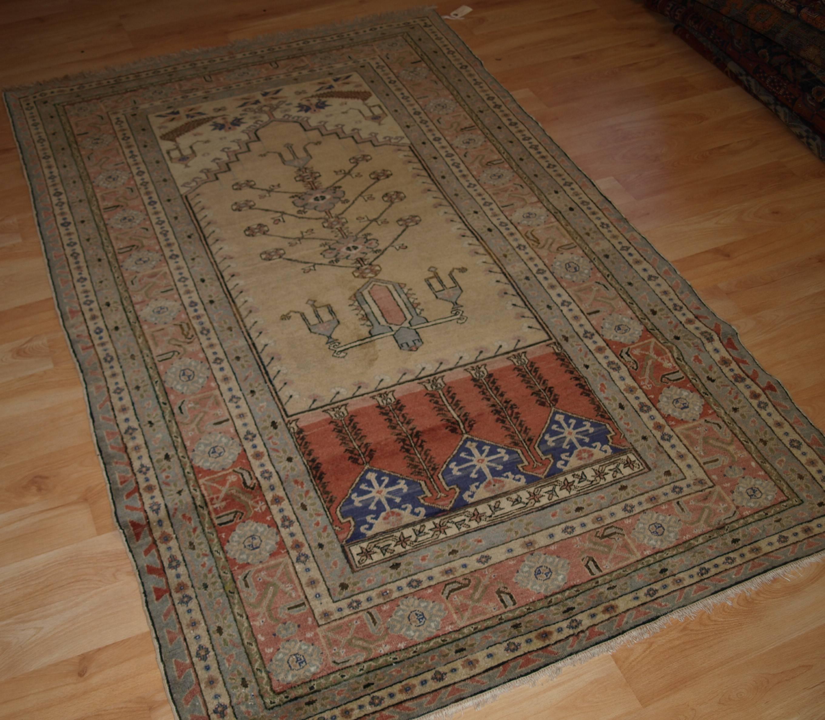 Antique Turkish Kayseri prayer rug, Ladik prayer design, circa 1900-1920.
Size: 6ft 0in x 3ft 11in (183 x 120cm).

Antique Turkish Kayseri prayer rug of traditional Ladik design with superb soft pastel colors,

circa 1900-1920.

The rug is in