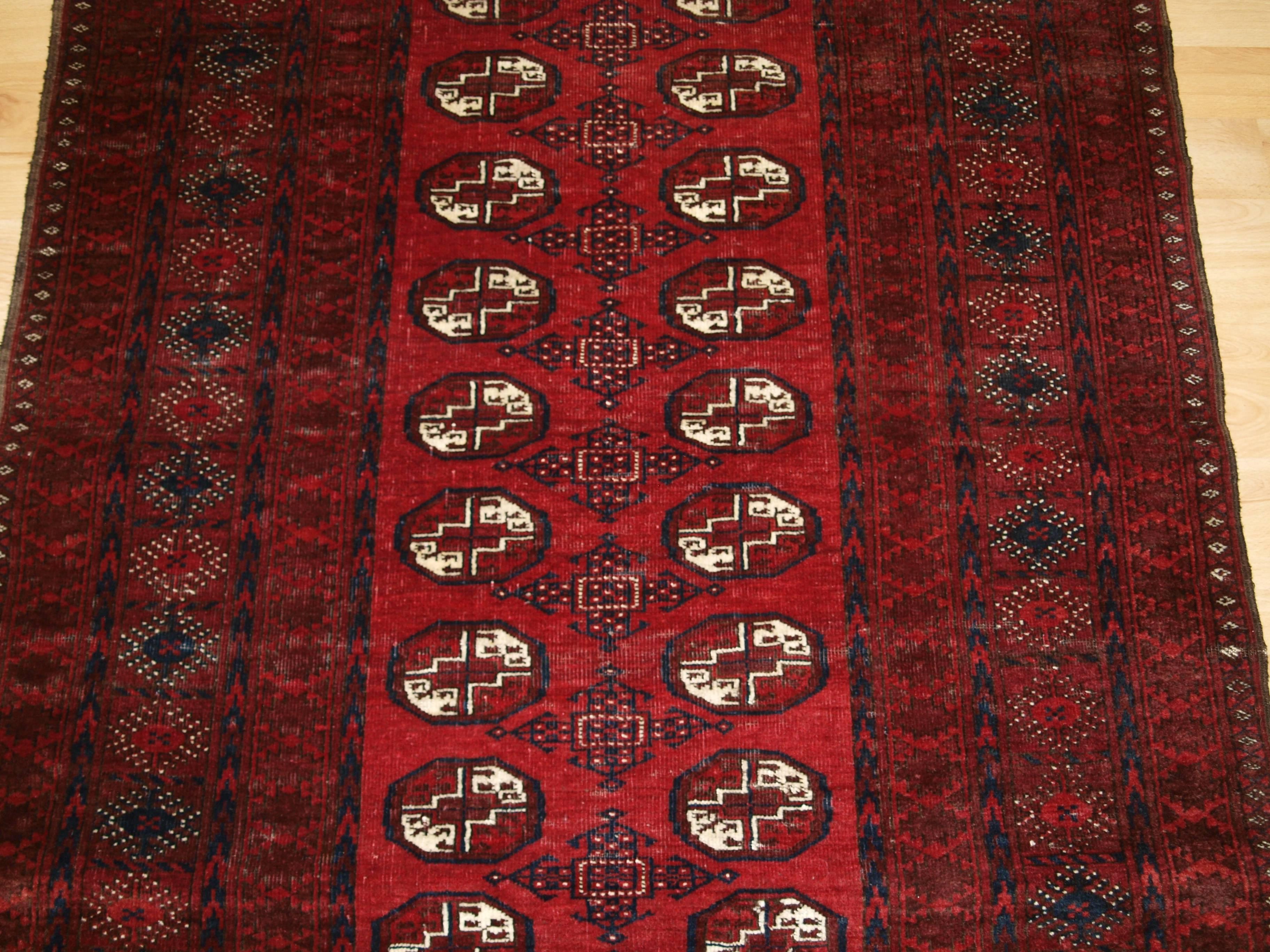 Old Afghan village rug, traditional design, rich colors, hard wearing, circa 1920.
Size: 6ft 2in x 4ft 1in (188 x 124cm).

Old Afghan village rug of traditional Turkmen design, the rug is a rich red color,

circa 1920.

The rug is in good
