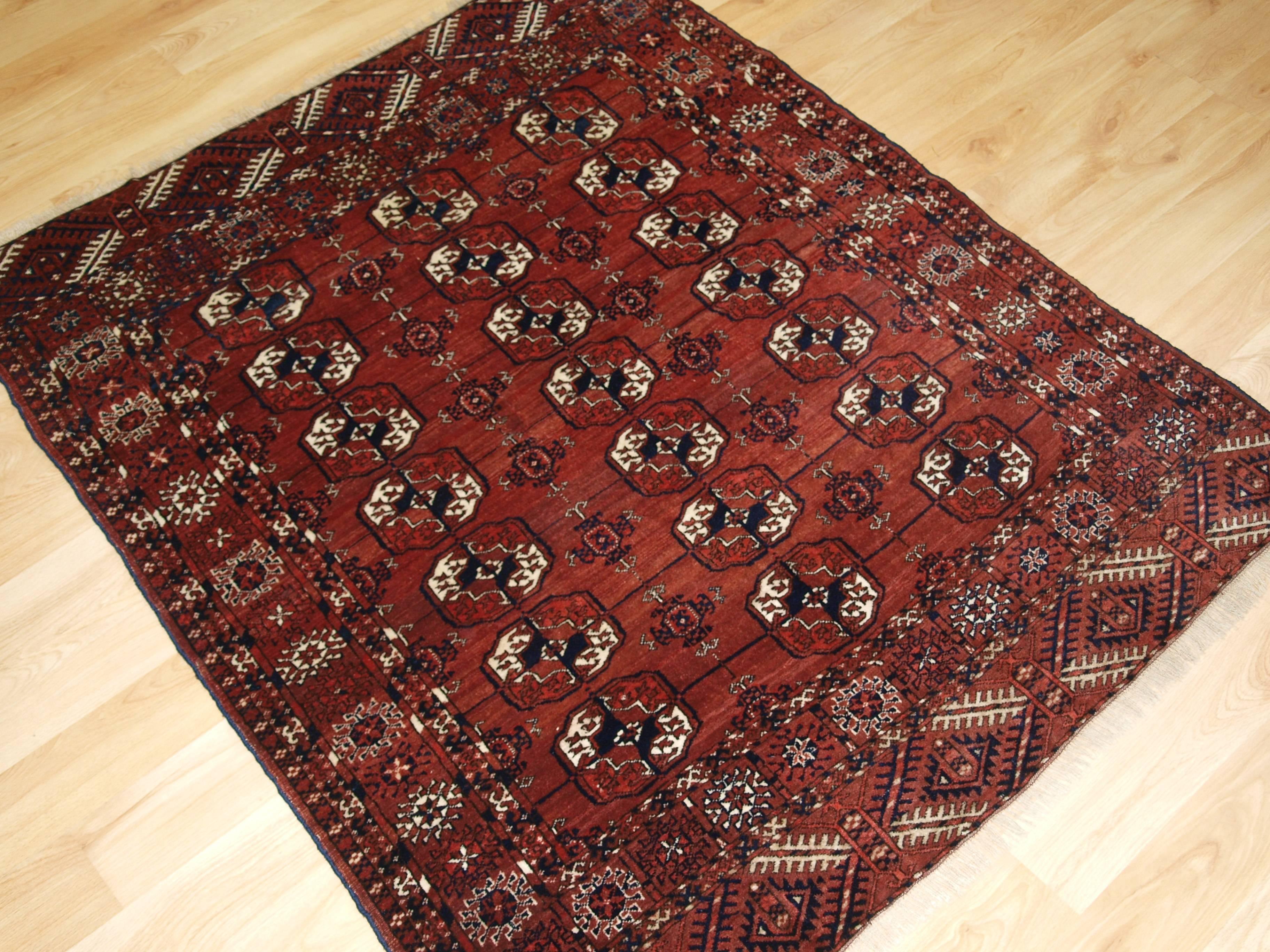 Antique Tekke Turkmen rug, small size with superb color and velvet like feel, circa 1900
Size: 4ft 3in x 3ft 7in (130 x 109cm).

Antique Tekke Turkmen rug of excellent design and color, the rug is of a rich red/brown color,

  

The rug has a
