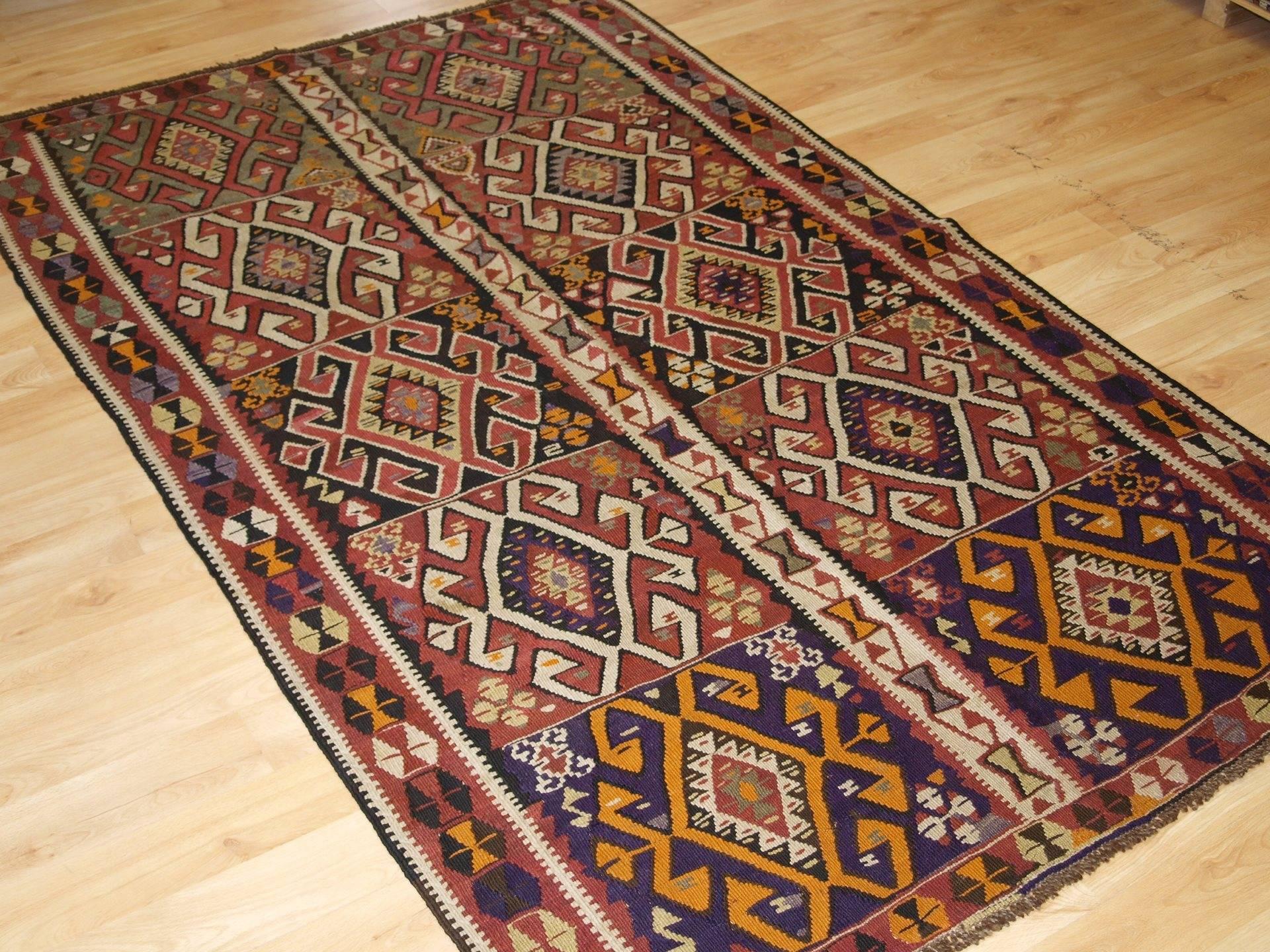 Old Turkish Kars Kilim with traditional village design, circa 1930
Size: 6ft 9in x 4ft 2in (205 x 127cm).

Old Turkish Kars Kilim, of traditional village design. The Kilim has a rustic feel with a bold graphic design. 

  

The Kilim has a