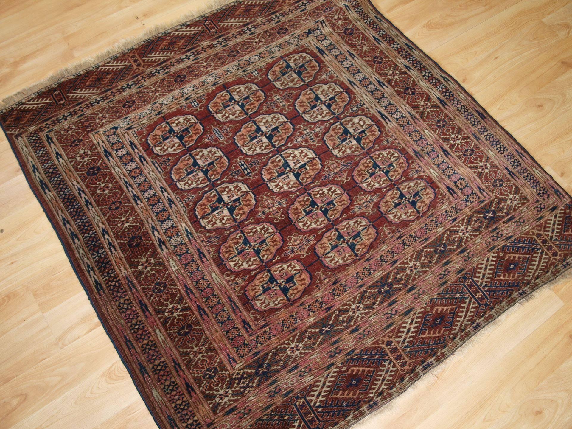 Early 20th Century Antique Tekke Turkmen Rug of Fine Weave and Small Square Size, circa 1900 For Sale
