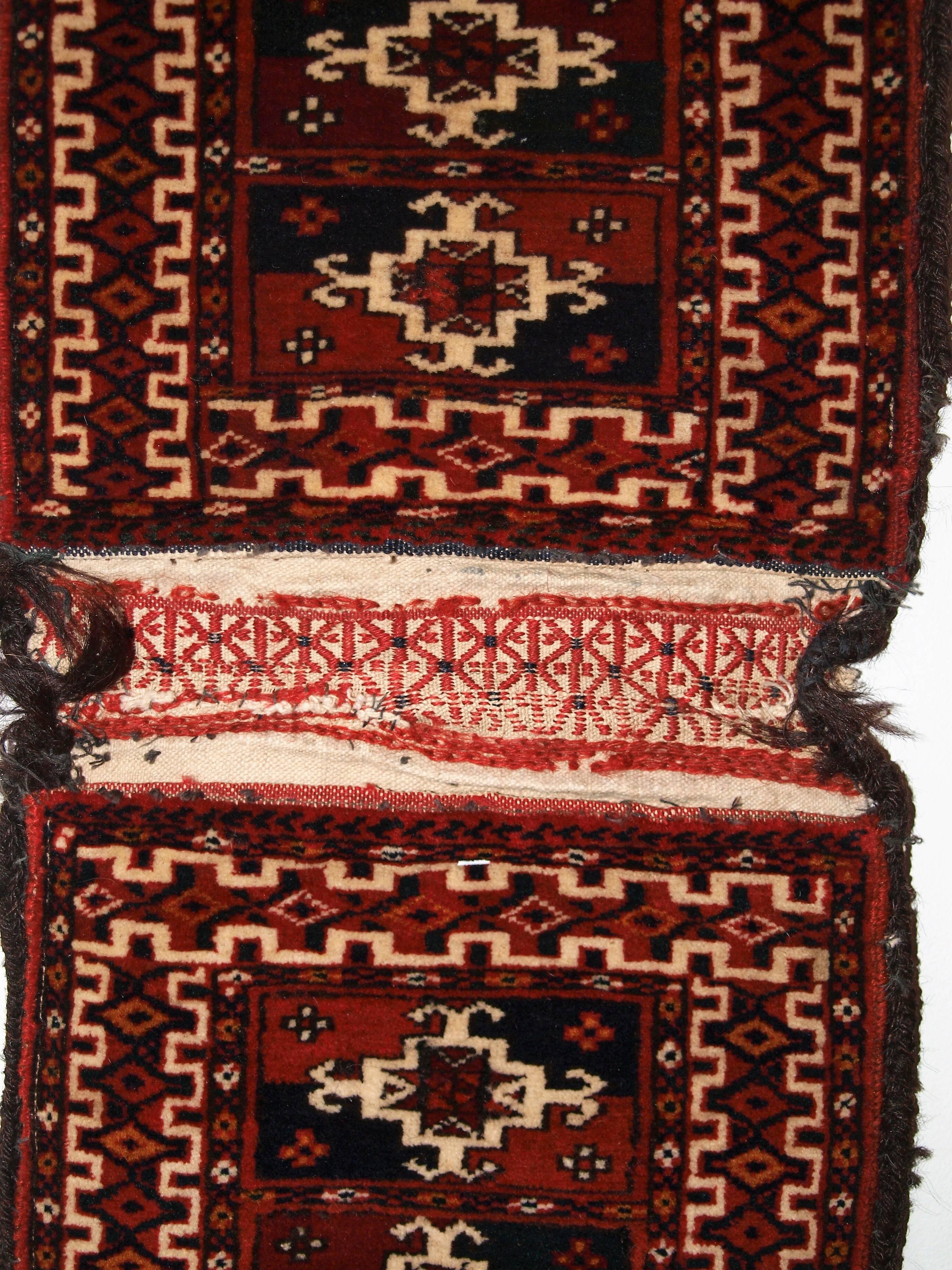 Wool Antique Tekke Turkmen Khorjin ‘Saddle Bag’ of Very Small Size, circa 1900 For Sale