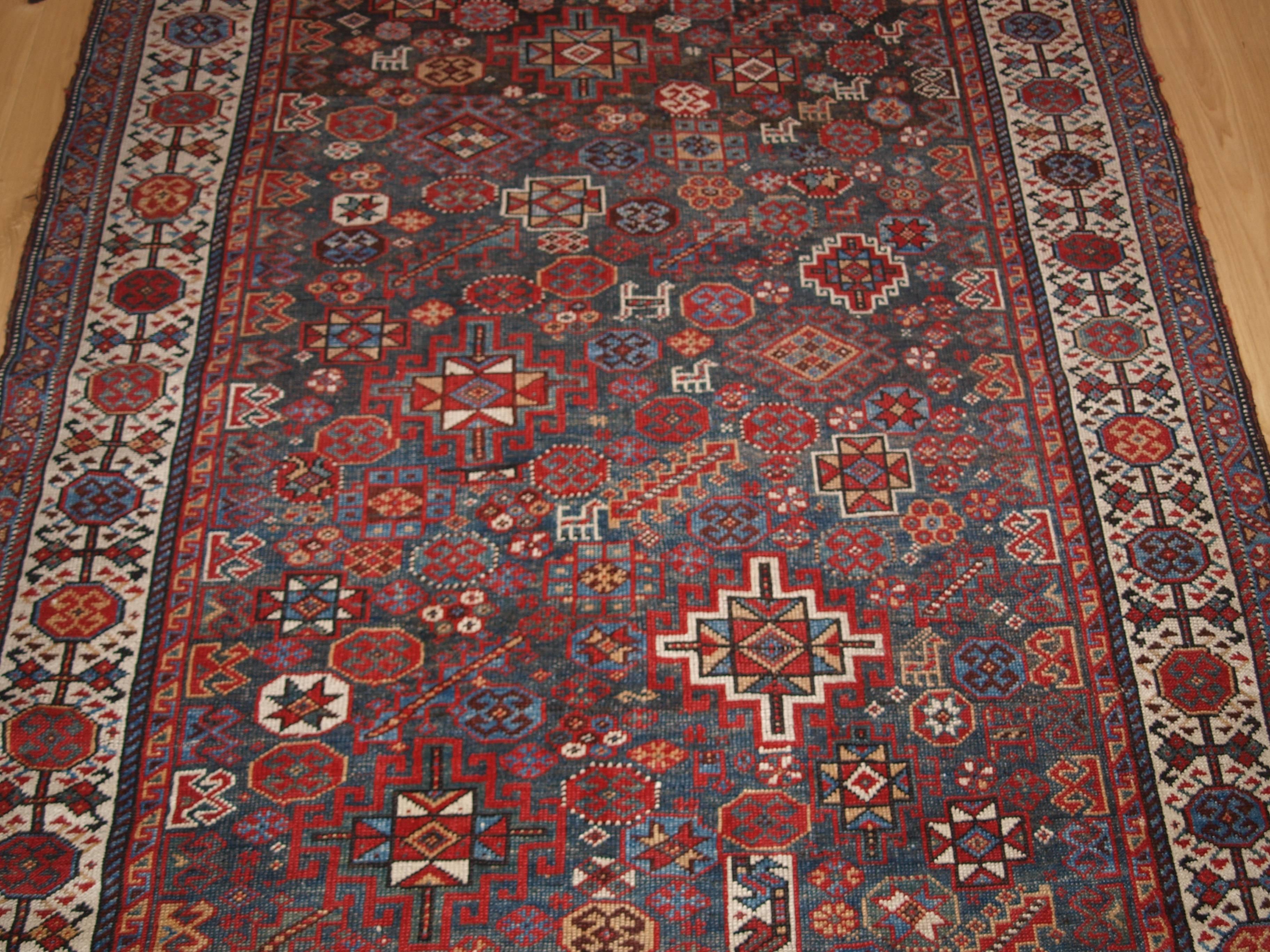 Antique South West Persian Luri rug with Shekarlu Design, circa 1900.
Size: 7ft 8in X 4ft 11in (234 X 151cm).

Antique Persian rug by the Luri tribe, the rug is of tribal design with a Shekarlu border.

circa 1900.
  

The abrashed indigo