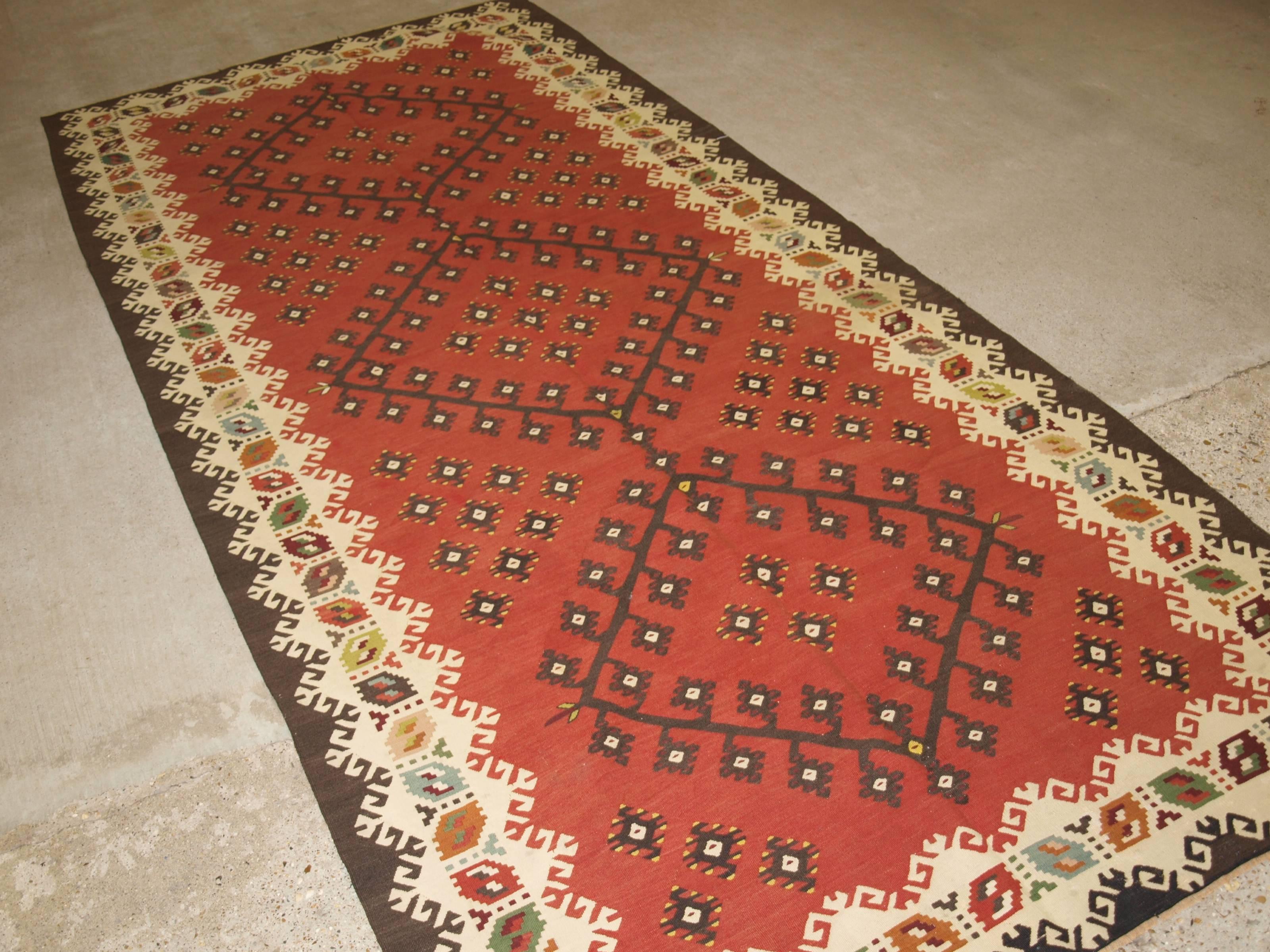 Antique Turkish Sharkoy Kilim, classic design, circa 1920
Size: 10ft x 4ft 6in (305 x 137cm).

Antique Anatolian Sharkoy Kilim, Western Turkey,

circa 1920.

Sharkoy kilims are also known as Sarkoy or Thracian, they originate from Western