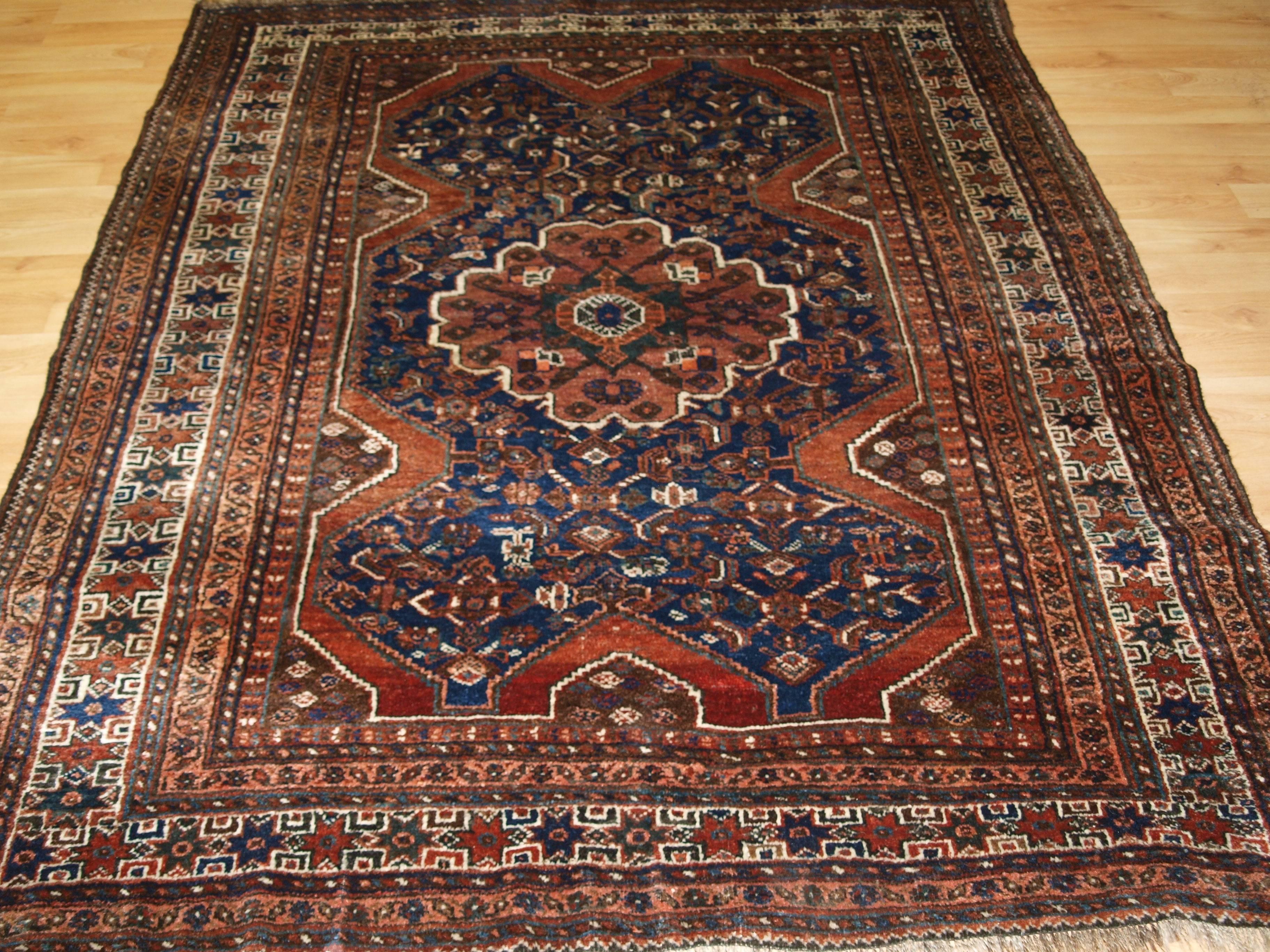 Size: 6 feet 9 in x 5 feet 5in (205 x 166cm).

Antique South West Persian Khamseh Baharlu tribal rug of Classic single medallion design,

circa 1900.

These are one of the less common Khamseh rugs and usually have a single round medallion as