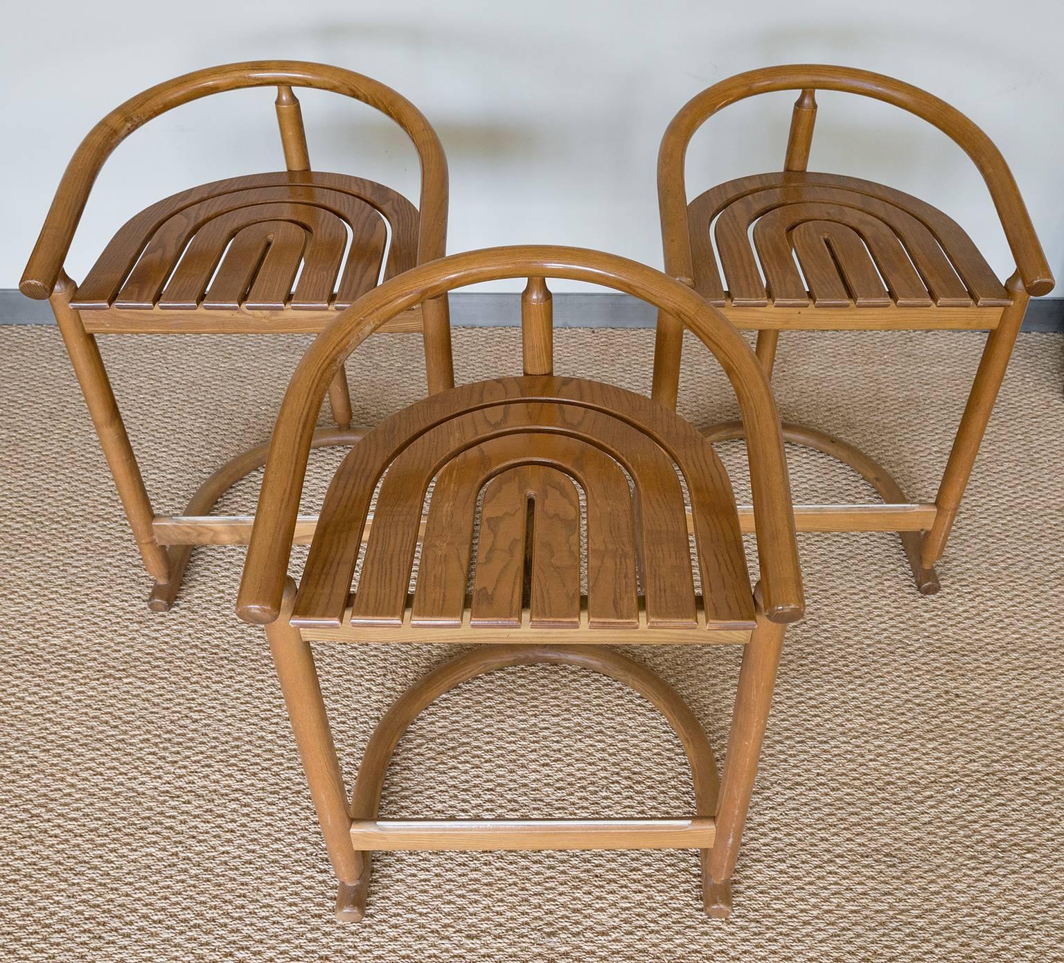 A set of three unique oak counter stools, 1970s.
