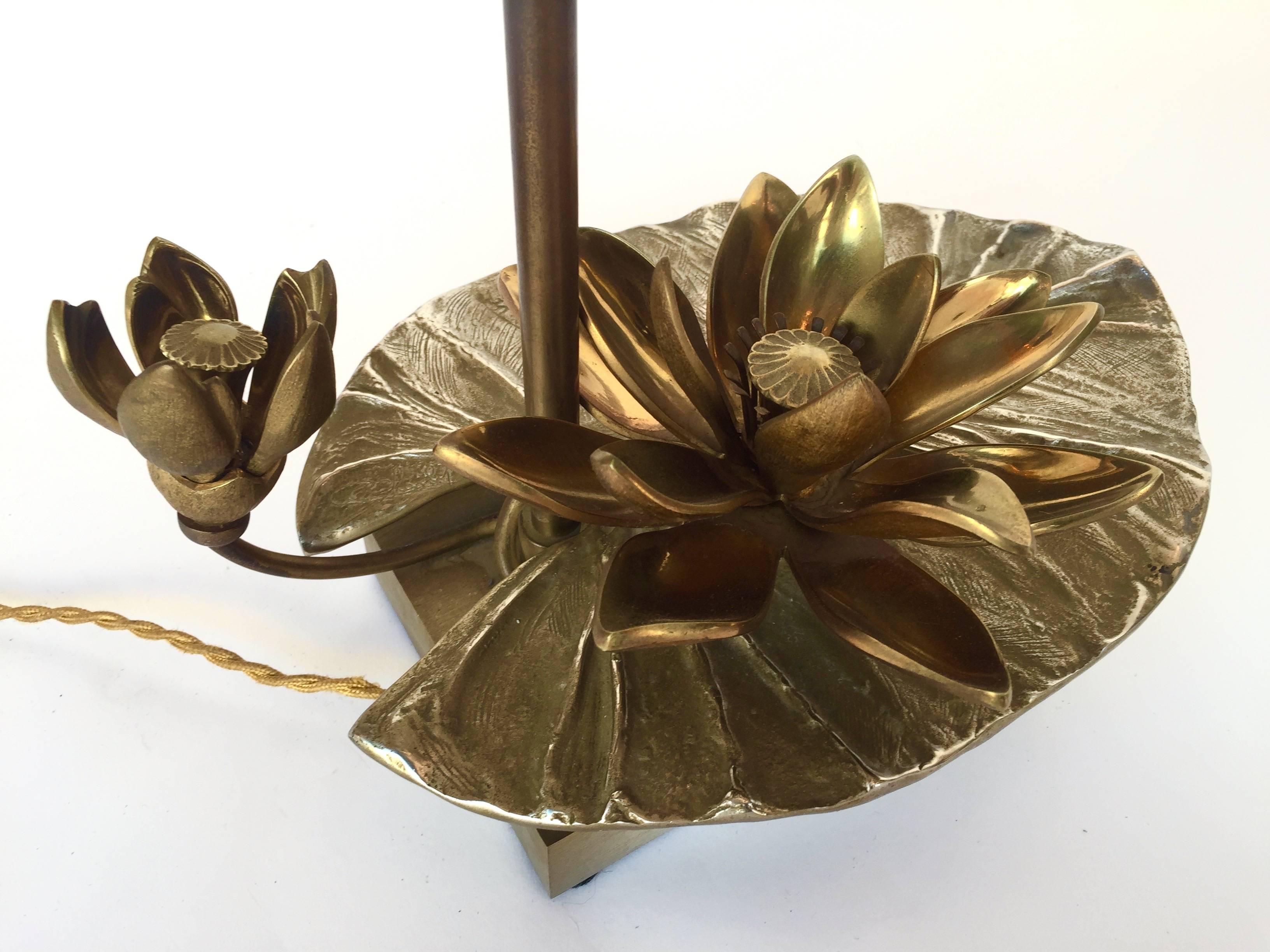 Rare pair of nenuphar or water lily pad lamps by Chrystiane Charles for Maison Charles. Real pair born together, there is a left and right lamp mounted in the opposite side. Iconic model from the 1970s. All in gilt bronze with the original