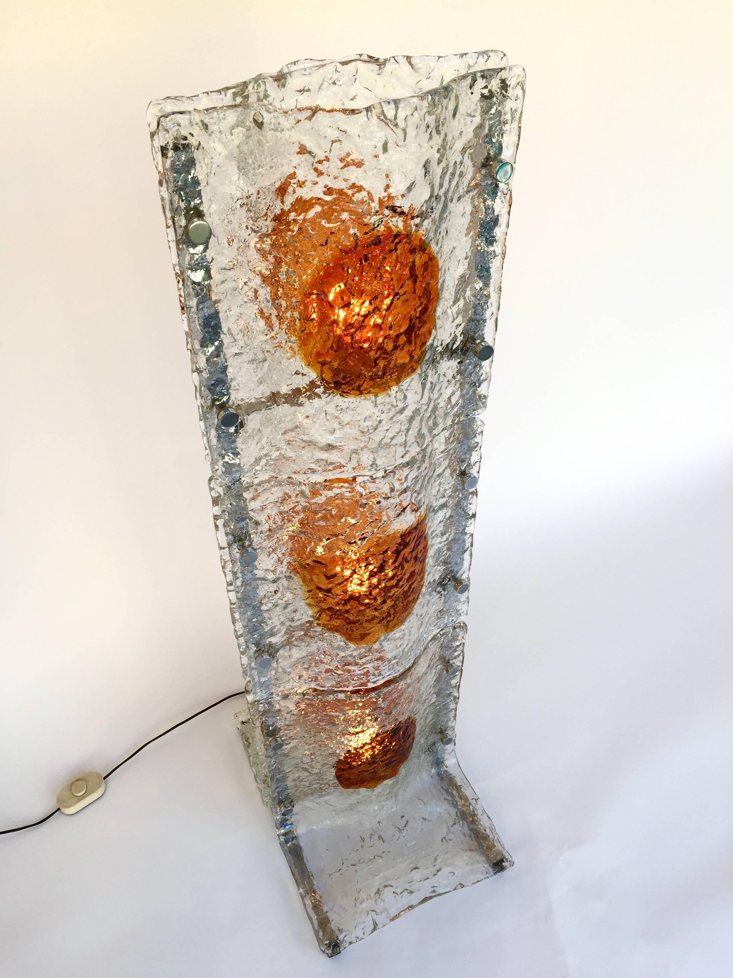 Rare Mid-Century Modern or space age floor lamps by the designer Toni Zuccheri for the manufacturer Mazzega Murano. Iconic of the Italian design. The great Murano glass quality, orange point typical from Zuccheri works. Excellent condition, can be a