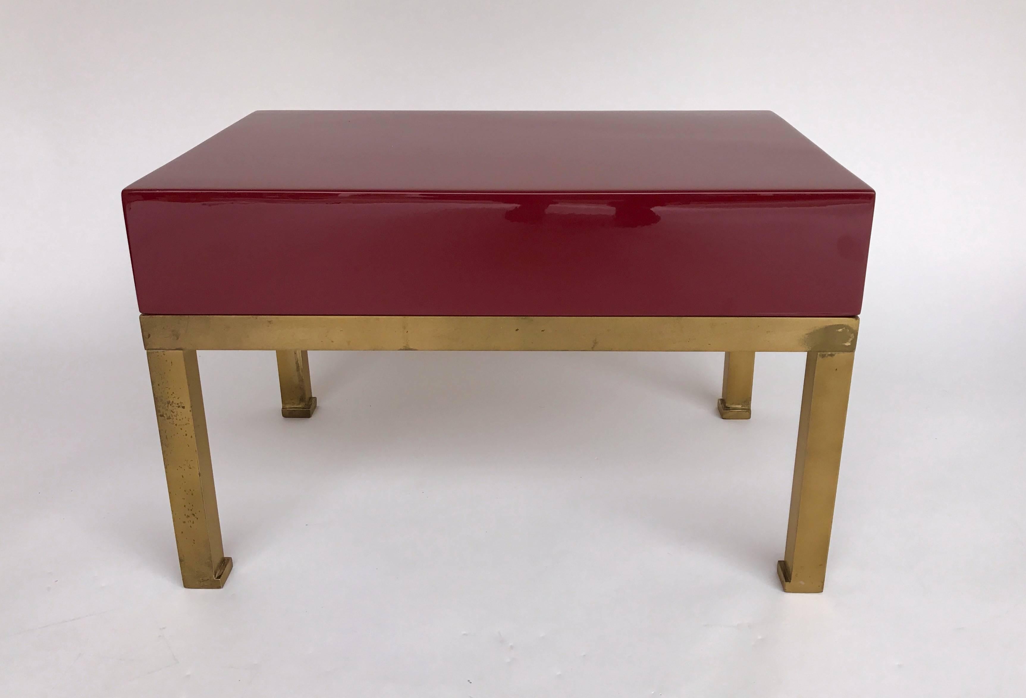 Pair of end side tables or nightstands by the designer Guy Lefevre for Maison Jansen. Very nice red Crushed raspberry lacquered mint condition. Brass Feet nice patina, interior drawer in mahogany wood. Guy Lefevre is the best reference for lacquered